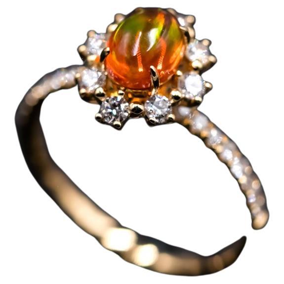 The Stunning - Mexican Fire Opal Engagement Halo Diamond Ring 18K Yellow Gold Promise Ring.

Design name: The Stunning!

Design idea: supreme quality of fire opal surrounded by 24 vs quality diamonds, which is simply stunning, elegant