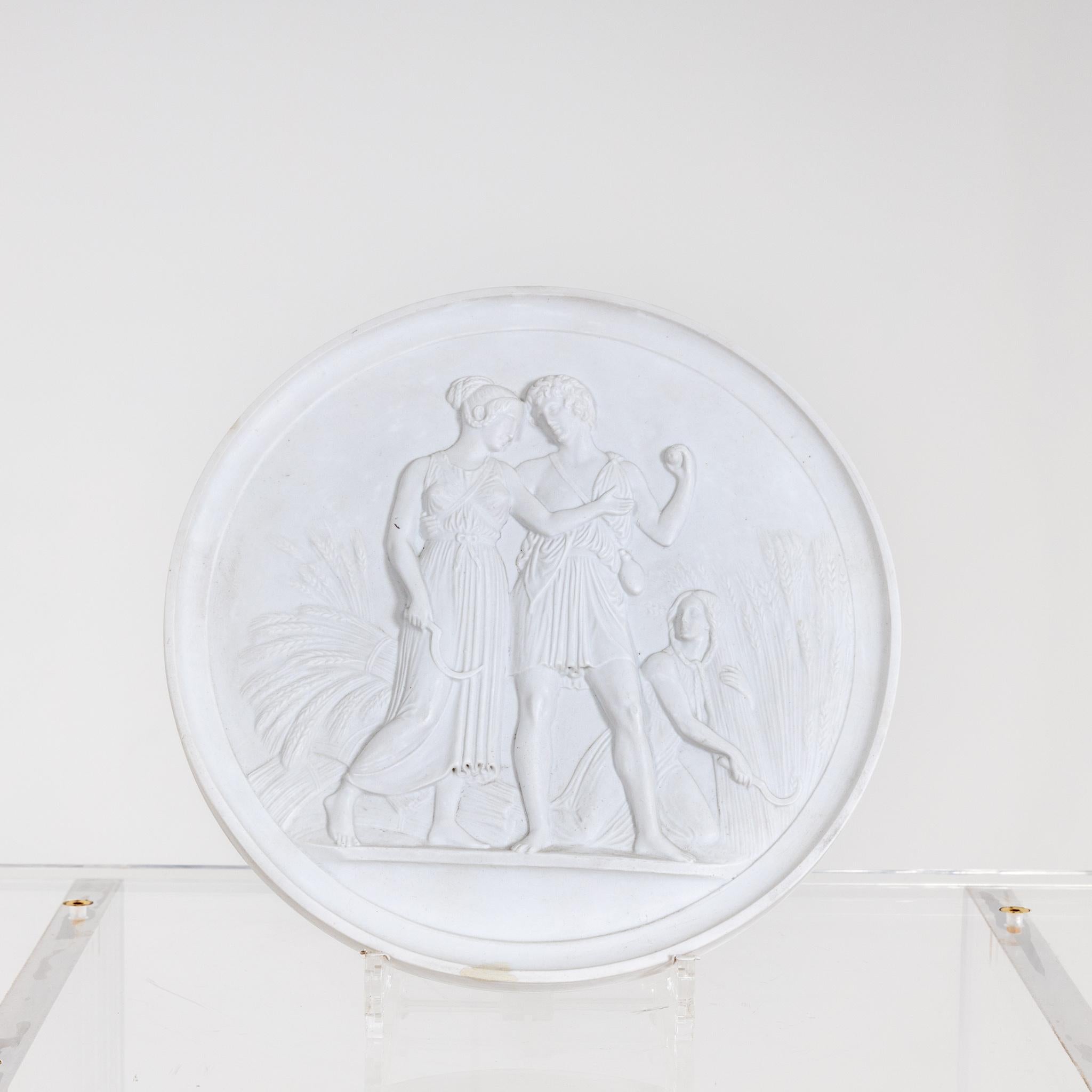 Round biscuit porcelain plaque depicting summer after the Four Seasons cycle by Bertel Thorvaldsen.