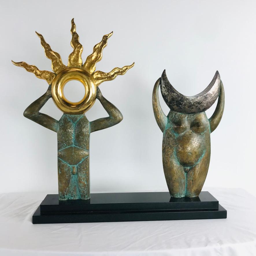 This beautiful piece by renowned artist Henry Schiowitz (American, born 1955) is sculpted in patinated cast bronze with gold and silver plating atop a black marble base. c. 2005.