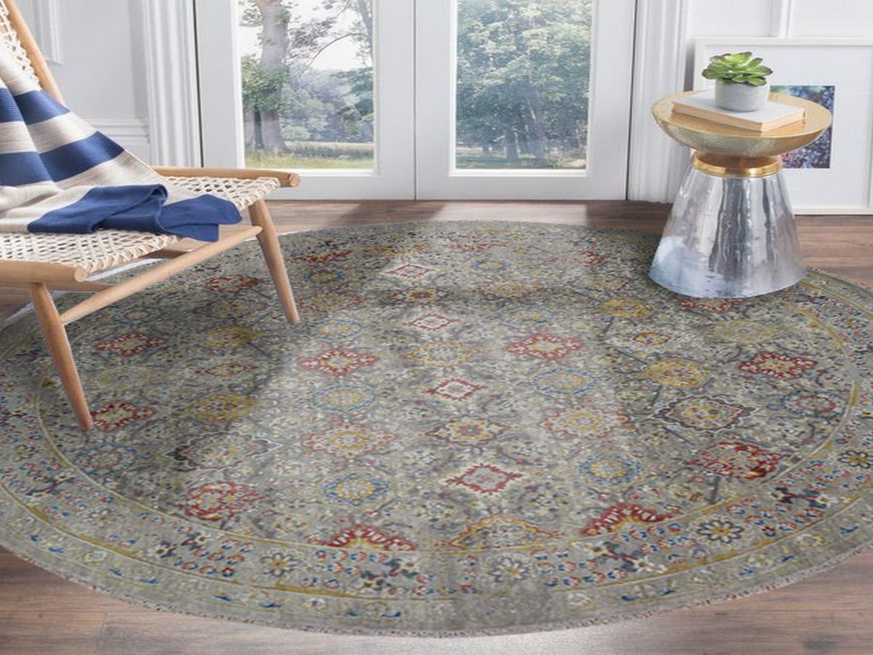 This is a truly genuine one-of-a-kind THE SUNSET ROSETTES pure silk and wool hand knotted oriental round rug. It has been knotted for months and months in the centuries-old Persian weaving craftsmanship techniques by expert artisans.

Primary