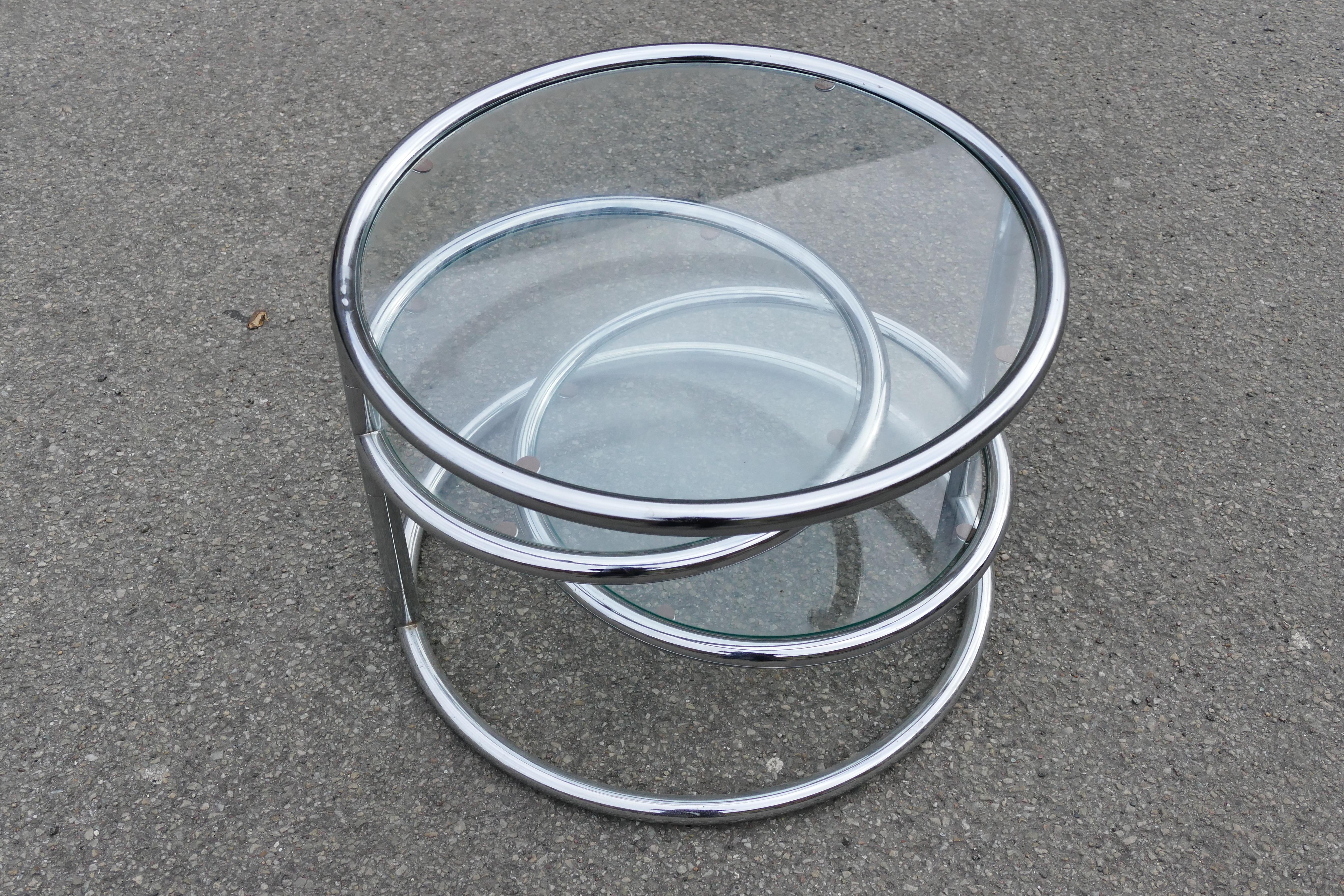 Legendary Artdeco swivel table with three different options in the style of Milo Baughman and Eileen Gray.