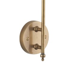 The Taplow Sconce in Cast and Hand-spun Brass shown in Antique Brass finish