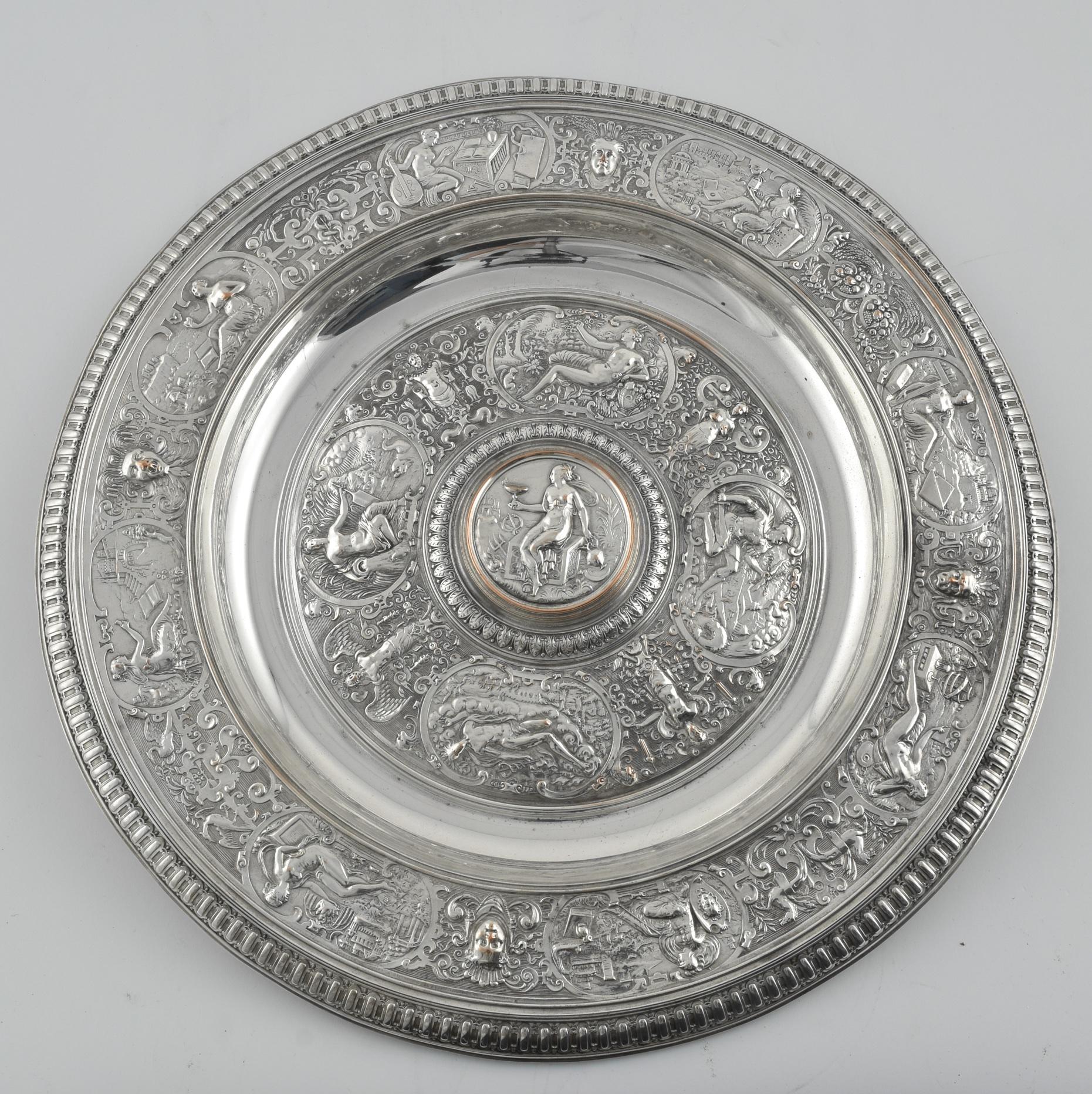 The original Temperance Basin was made by François Briot around 1585 and was acquired by the V&A in 1855. The most notable reproduction is the silver gilt Wimbledon Ladies Singles Championship trophy made by Elkington and Co in 1864, and has been