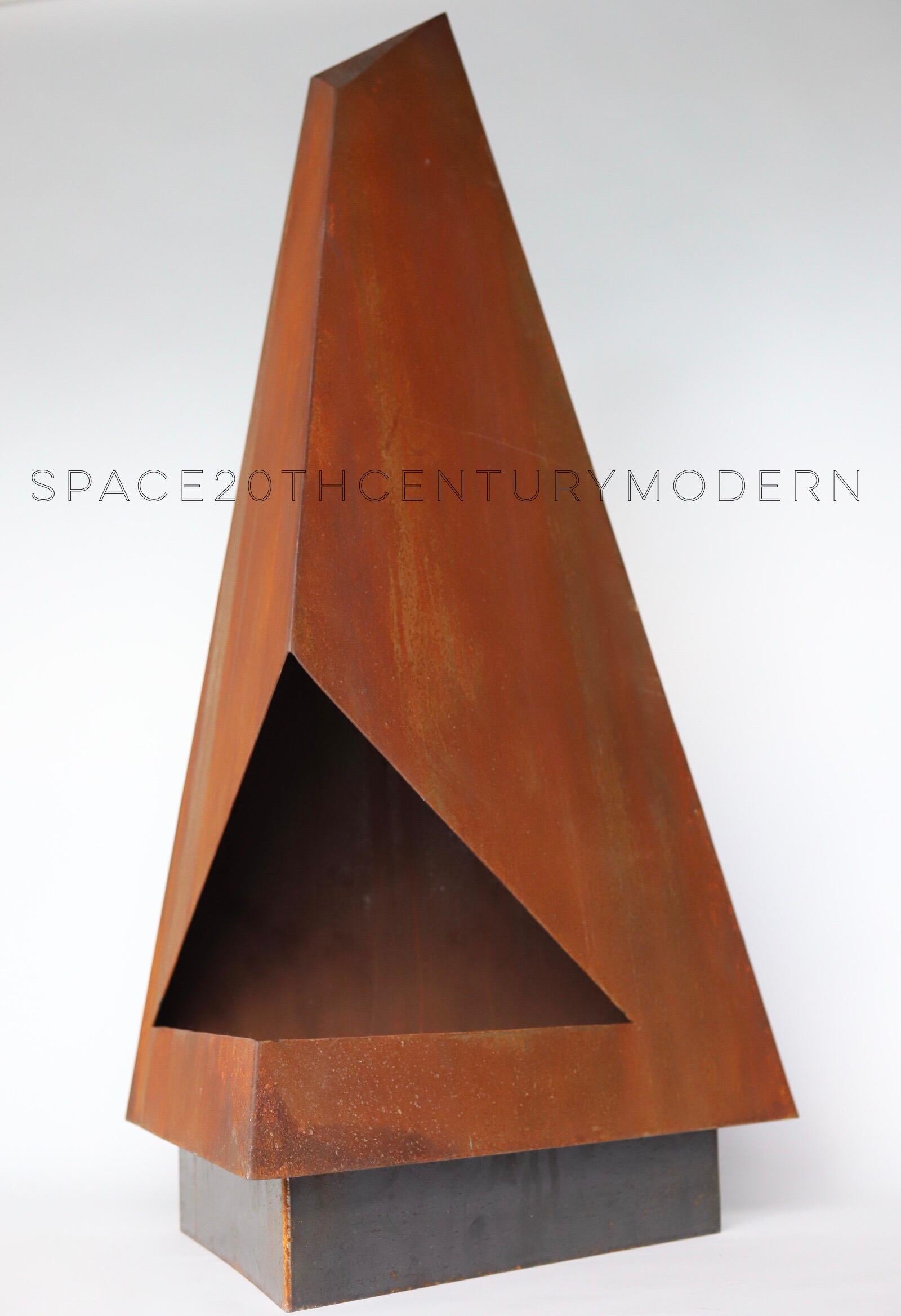 The Three by Space 20th Century Modern is not your normal chimney or fireplace. This high design, steel sculptural piece will make a statement in any outdoor space. Functionally, it is perfect on that cold evening, but also serves as an amazing art