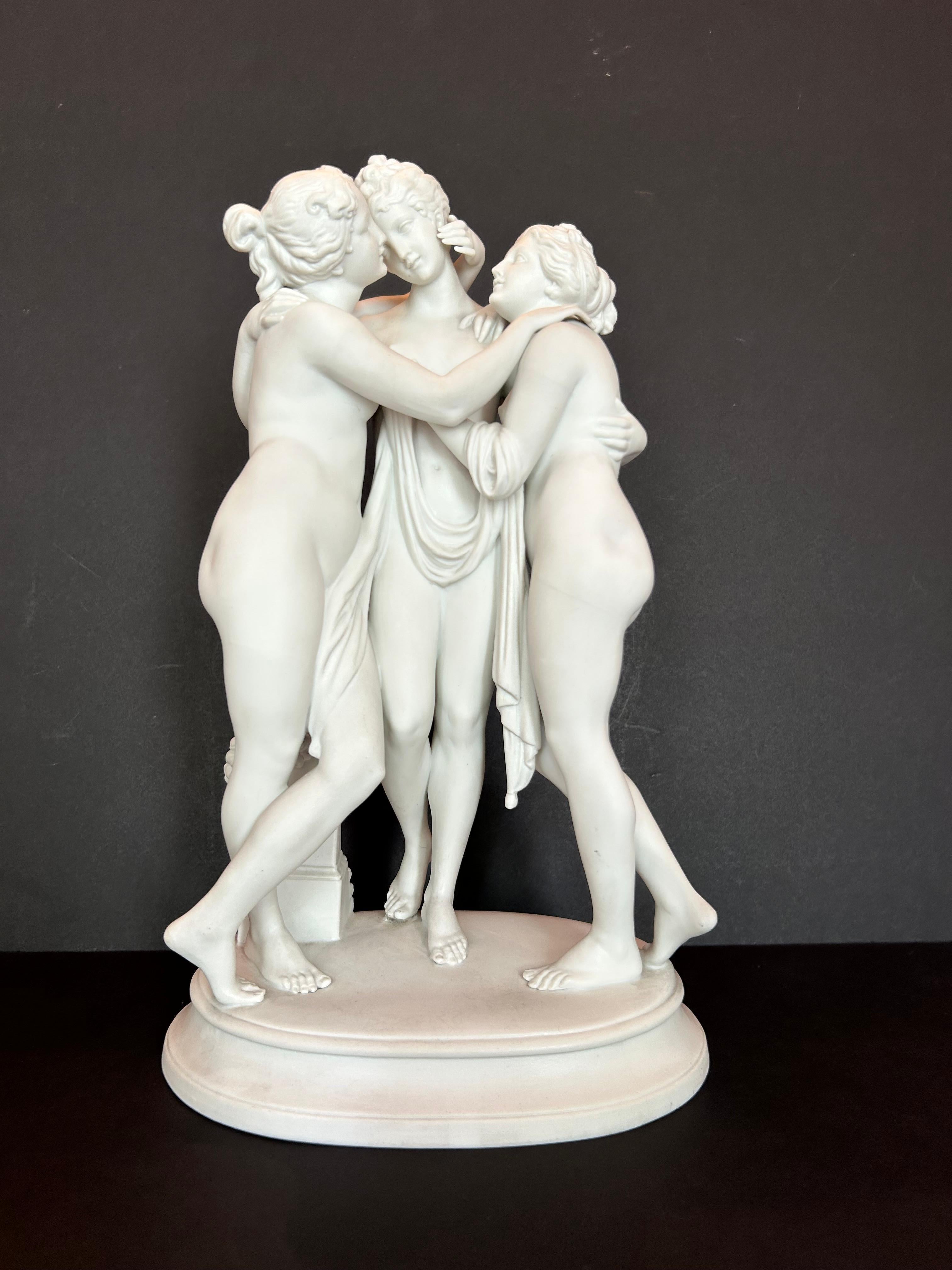 A wonderful bisque porcelain reproduction of The Three Graces, after Antonio Canova, one of the most celebrated artists of the 17th century. Canova's masterpiece The Three Graces is a Neoclassical sculpture, in marble, of the  three mythological