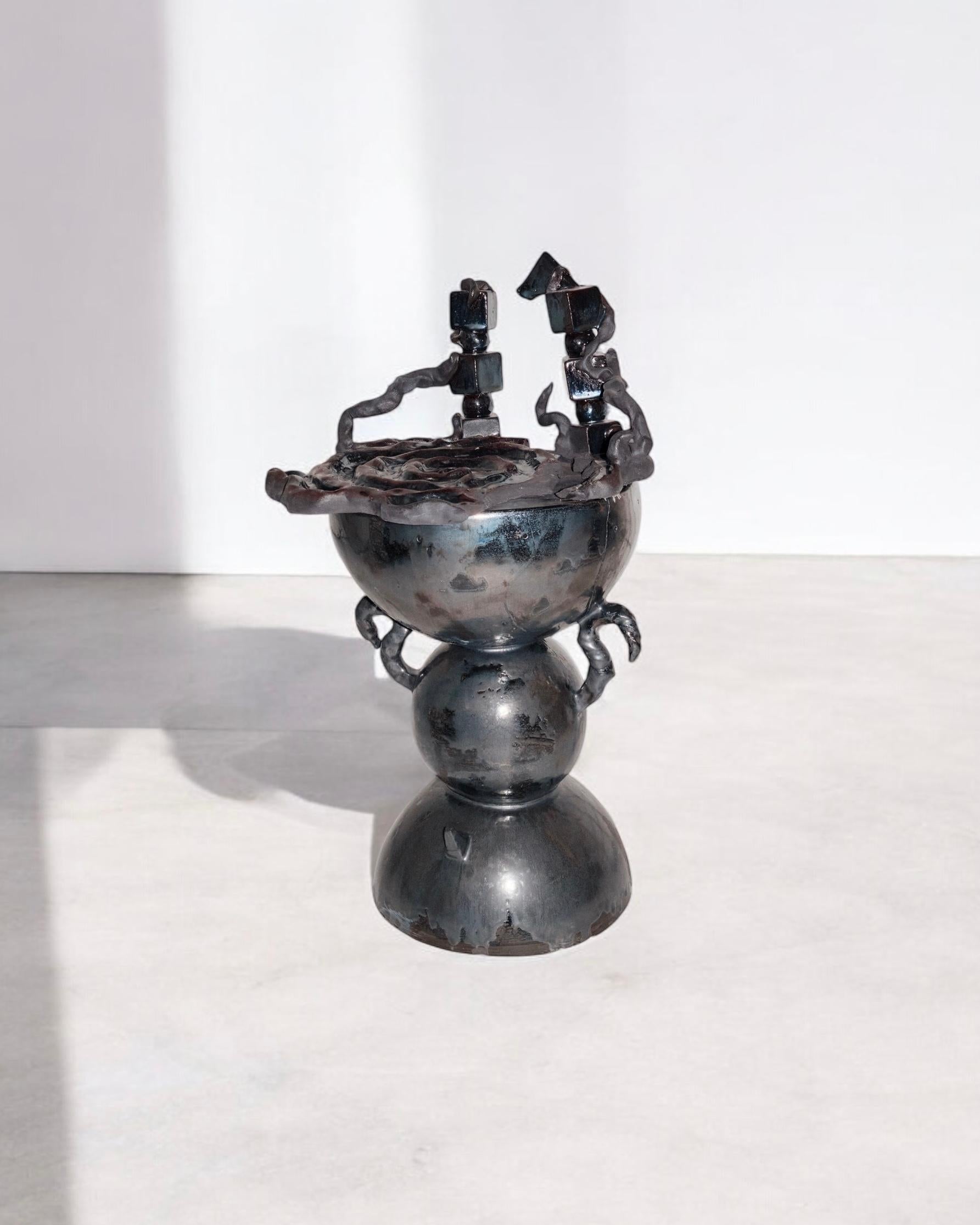 The Throne Sculpture in Glazed Ceramic & Black Epoxy by Lucile Rebeirot
Dimensions: D 35 x W 35 x H 52 cm. 
Materials: Glazed ceramic and black epoxy. 

Born in 1988, lives and works in Paris.

Ceramic artist using traditional plate modeling