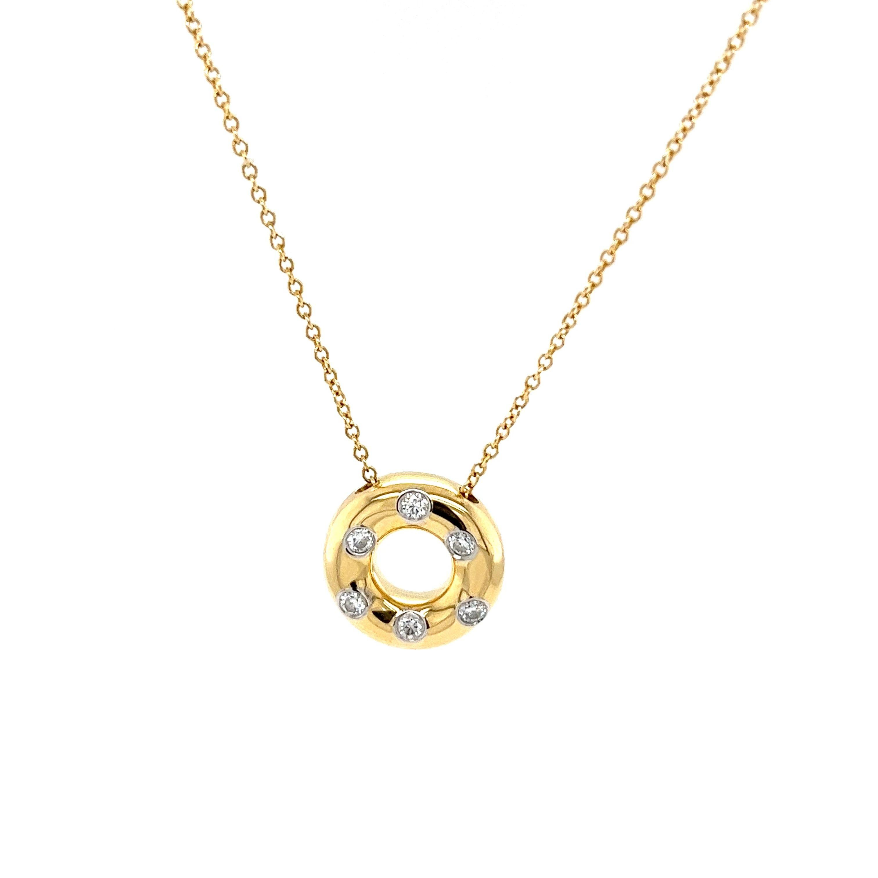 The Tiffany & Co. Étoile Diamond Pendant, set with six round diamonds, is a dazzling and sophisticated piece set in 18-carat yellow gold and platinum. The timeless design of this pendant makes it suitable for various occasions, from everyday wear to