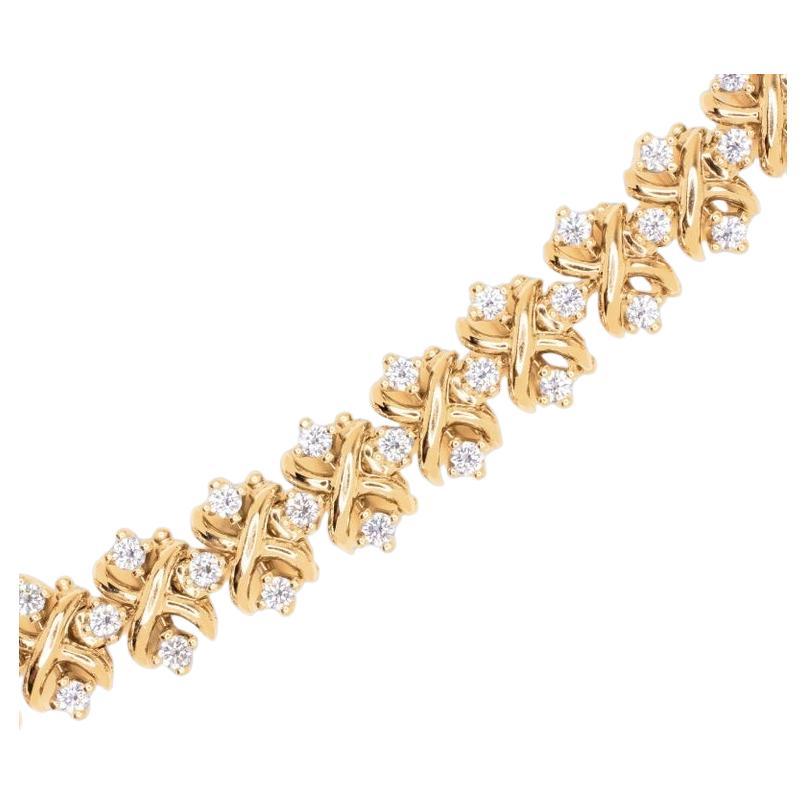 The Tiffany & Co. Schlumberger Lynn Diamond Bracelet is an exquisite piece crafted with a total weight of 3.05 ct of natural Round Brilliant Cut diamonds. The bracelet weighs 48.7 grams and measures 8 inches in length. There are 87 diamonds within