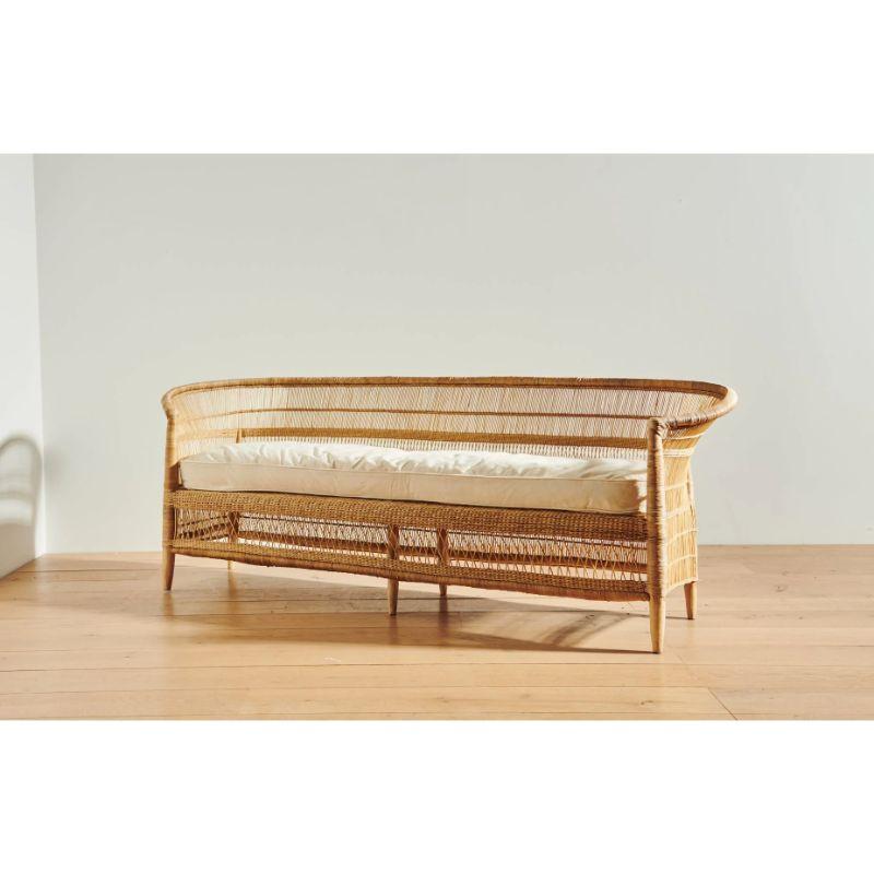 This sofa ever so artfully combines handwoven cane and solid wood with a plush linen and down-filled cushion, bringing long-lasting comfort to nearly any interior setting. We think it looks fantastic on display in common areas, but we also encourage
