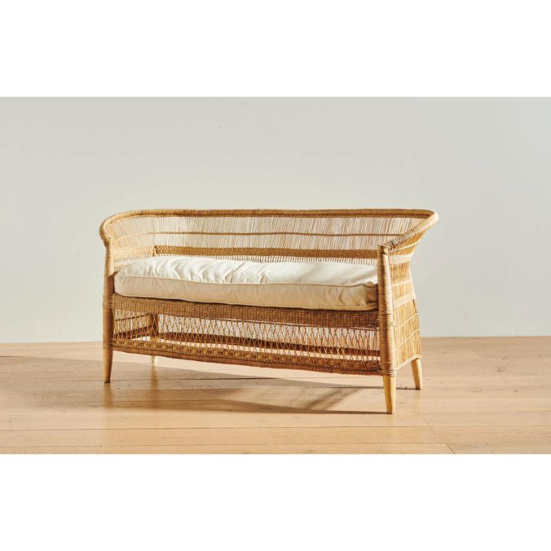 This sofa ever so artfully combines handwoven cane and solid wood with a plush linen and down-filled cushion, bringing long-lasting comfort to nearly any interior setting. We think it looks fantastic on display in common areas, but we also encourage