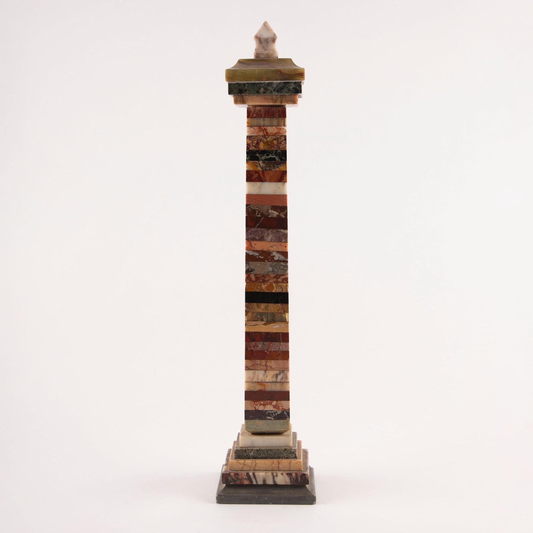 Grand Tour Specimen-Marble Obelisk, Italian, 19th century
A jewel-like tabletop obelisk built from alternating bands of polished specimen stones—giallo Siena, rouge griotte, verte antico, breccia, Portoro nero, and other richly veined Italian