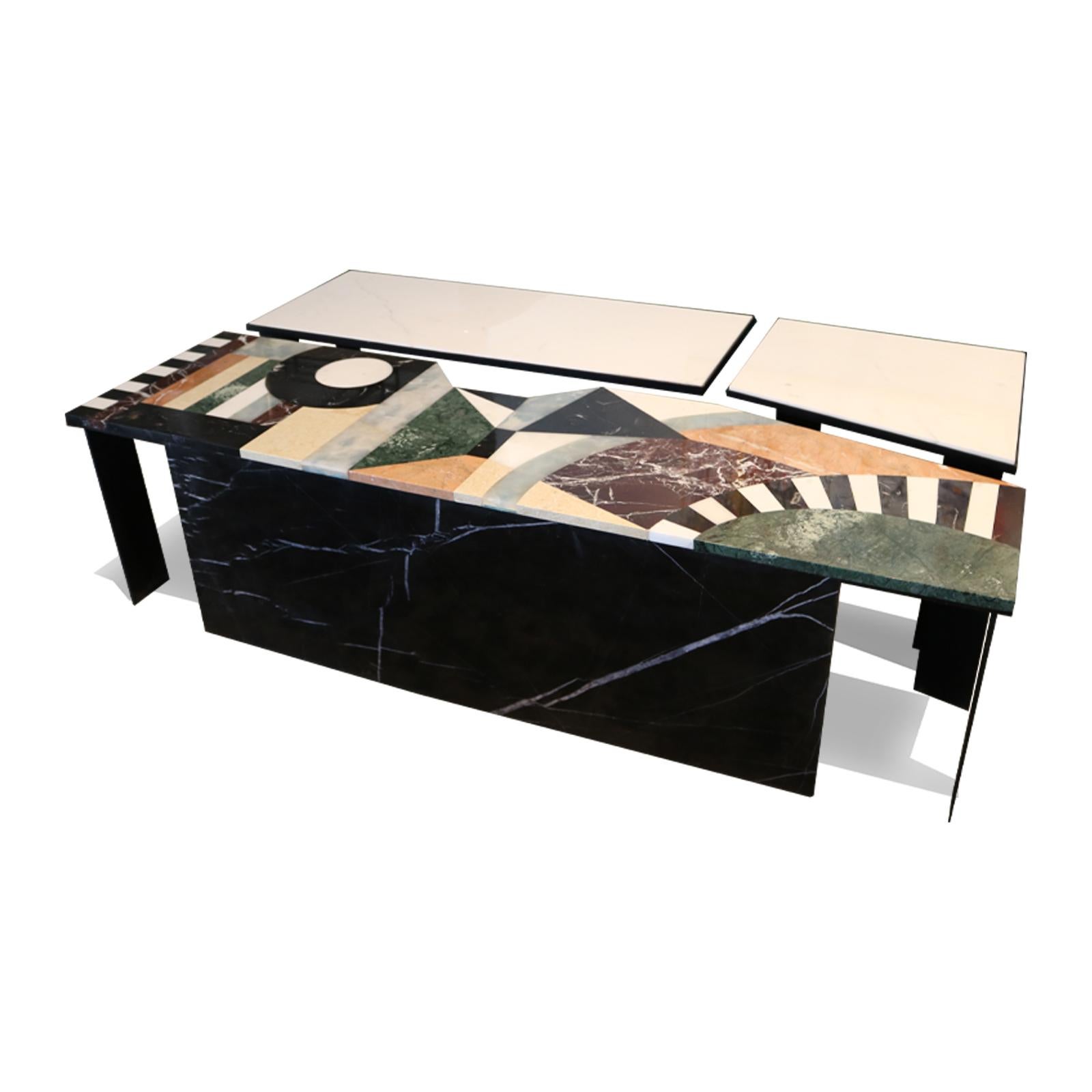 Introducing a remarkable fusion of simplicity and intricacy, we present to you a set of three breathtaking marble tables. These exquisite pieces embody a harmonious blend of patterns and colors, seamlessly integrated to create a magnificent