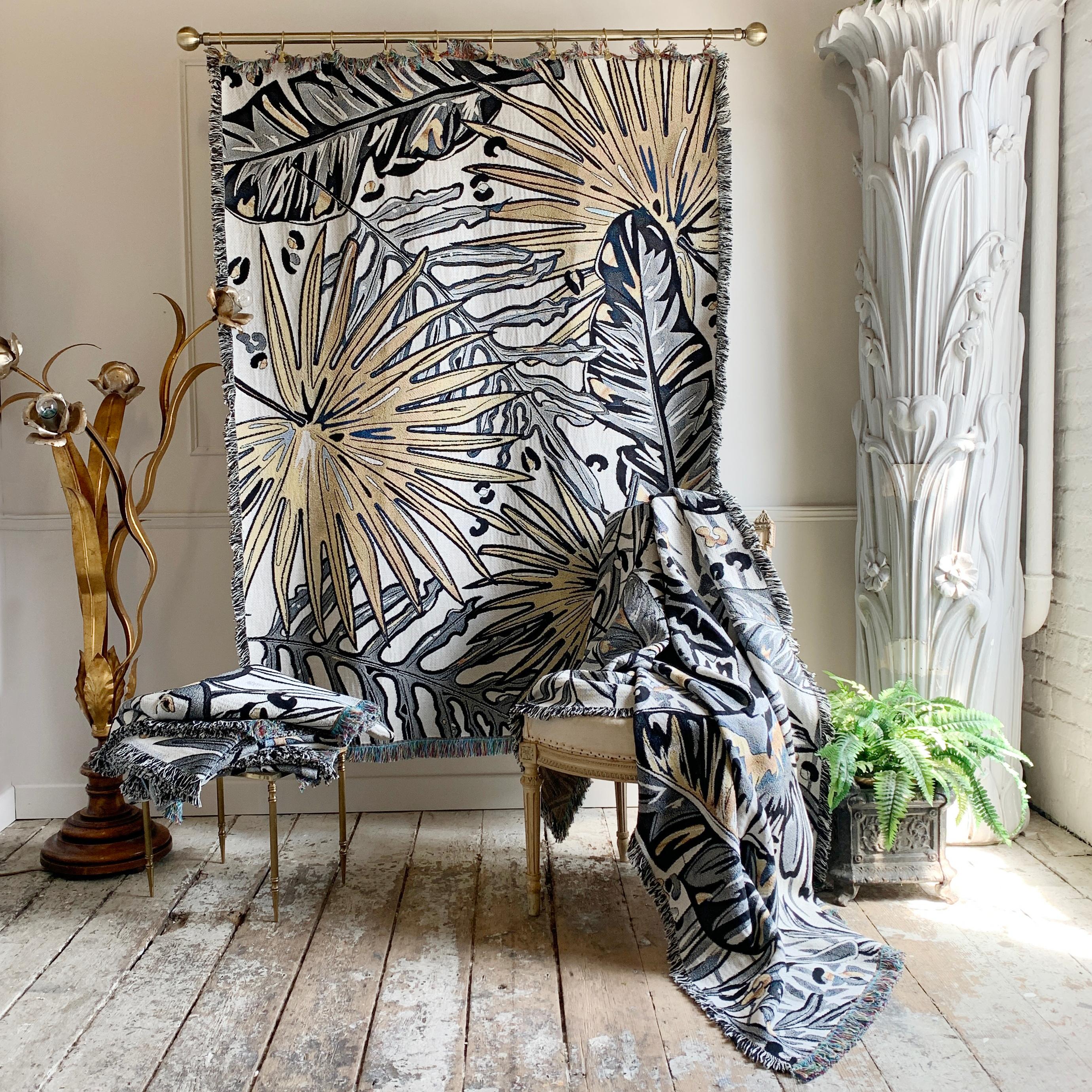 The Tropics Collection 'Palm Leaf' woven recycled cotton throw

As a throw, blanket, draped or a wall hung, this luxuriously versatile woven throw will create a bold statement in any interior.

Beautiful and dramatic monochrome throw, adorned