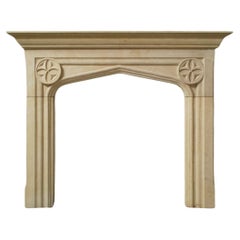 The Tudor: A Classic Tudor-Style Stone Fireplace with Quatrefoil Medallions