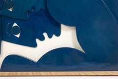 "The Twins". Bas-relief panel in blue-lacquered wood. Contemporary.