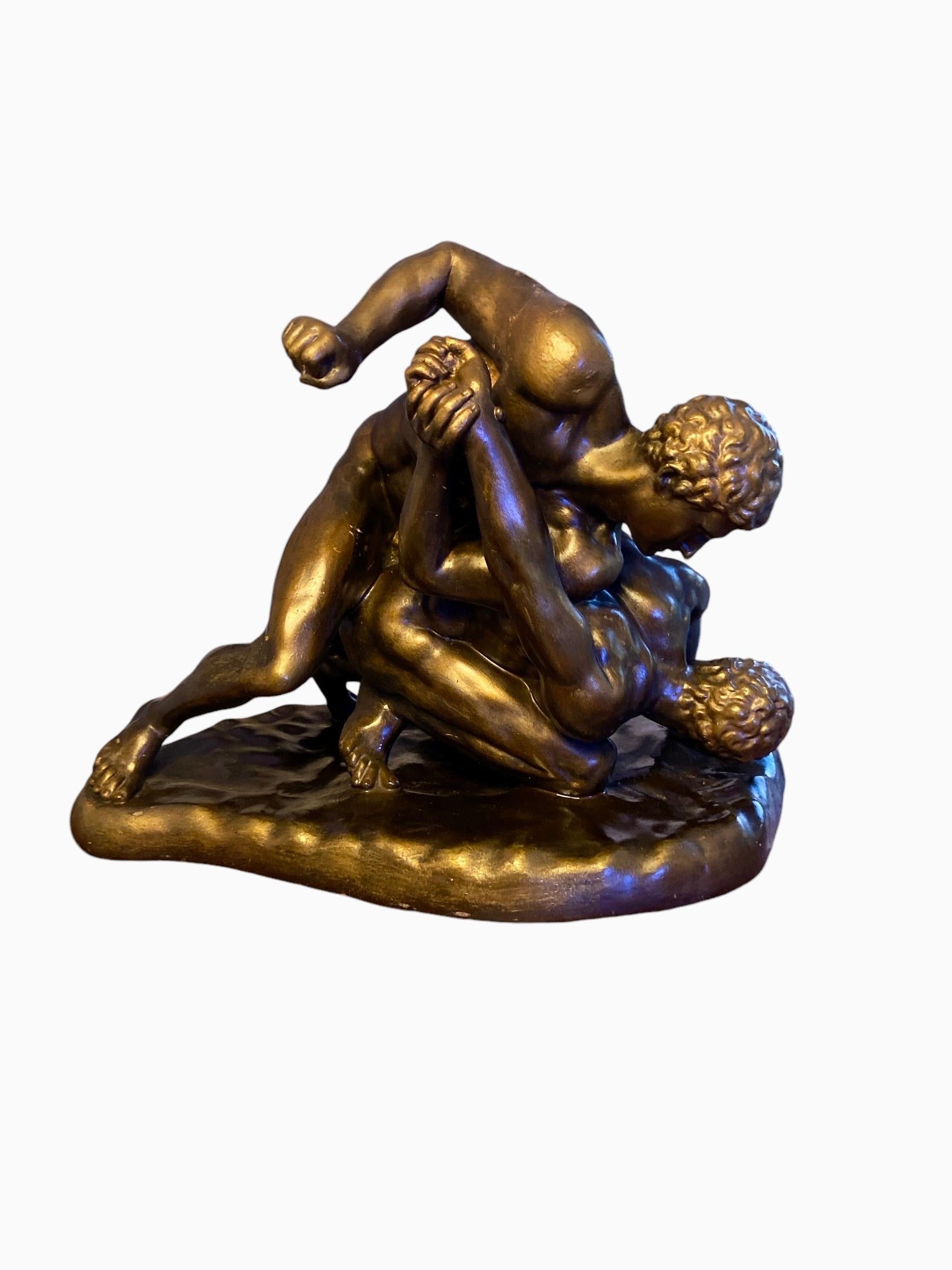 Large sculpture in bronzed plaster of the Uffizi Wrestlers, after the antique.
In a very good condition, beautiful patina.