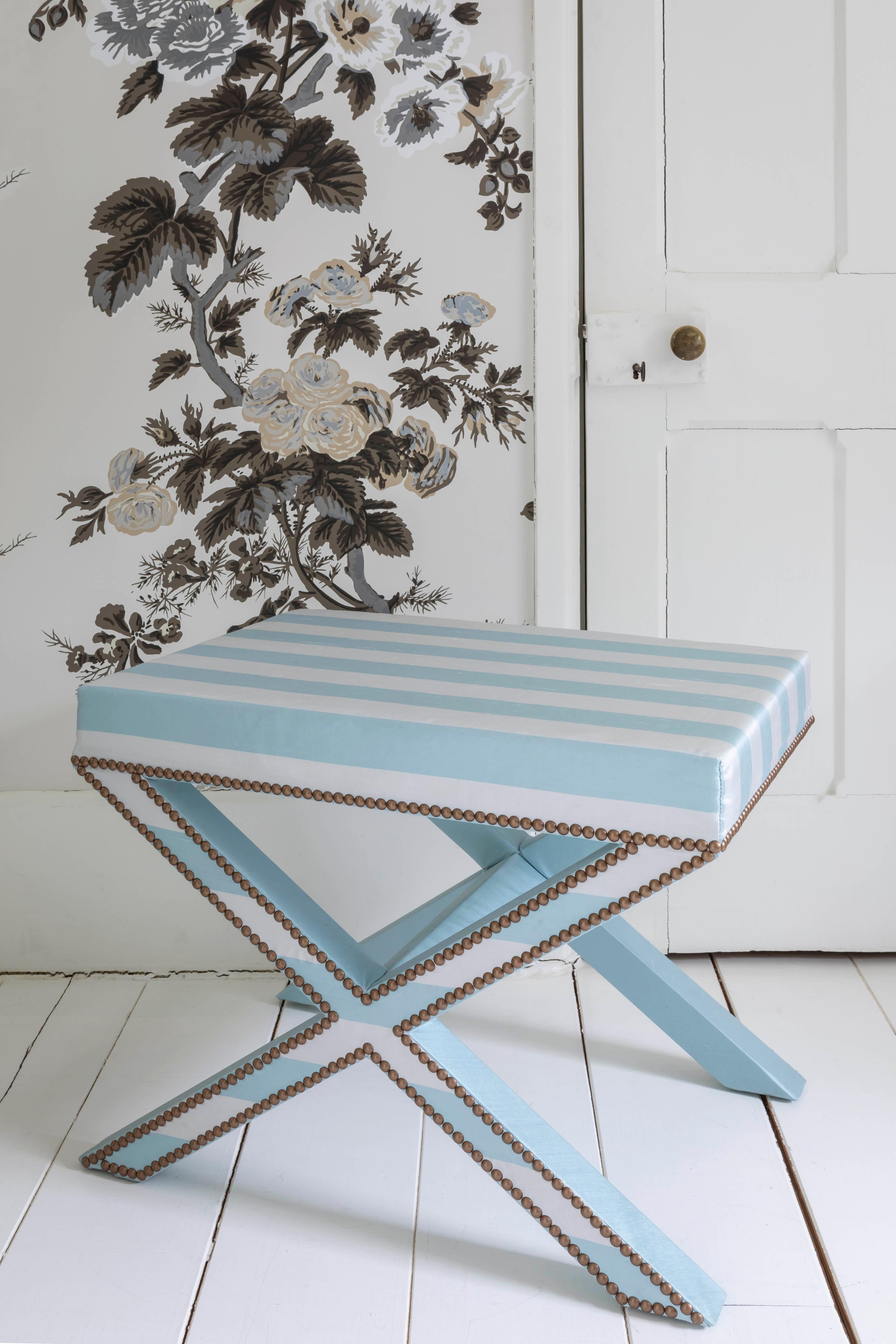 Regency The upholstered Alexander X-Frame stool in striped silk with nailing detail For Sale