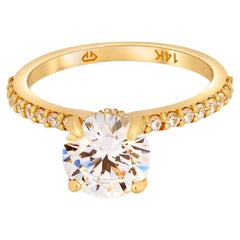 The Veiled Halo Round Brilliant Moissanite Engagement 14k Gold Ring. 