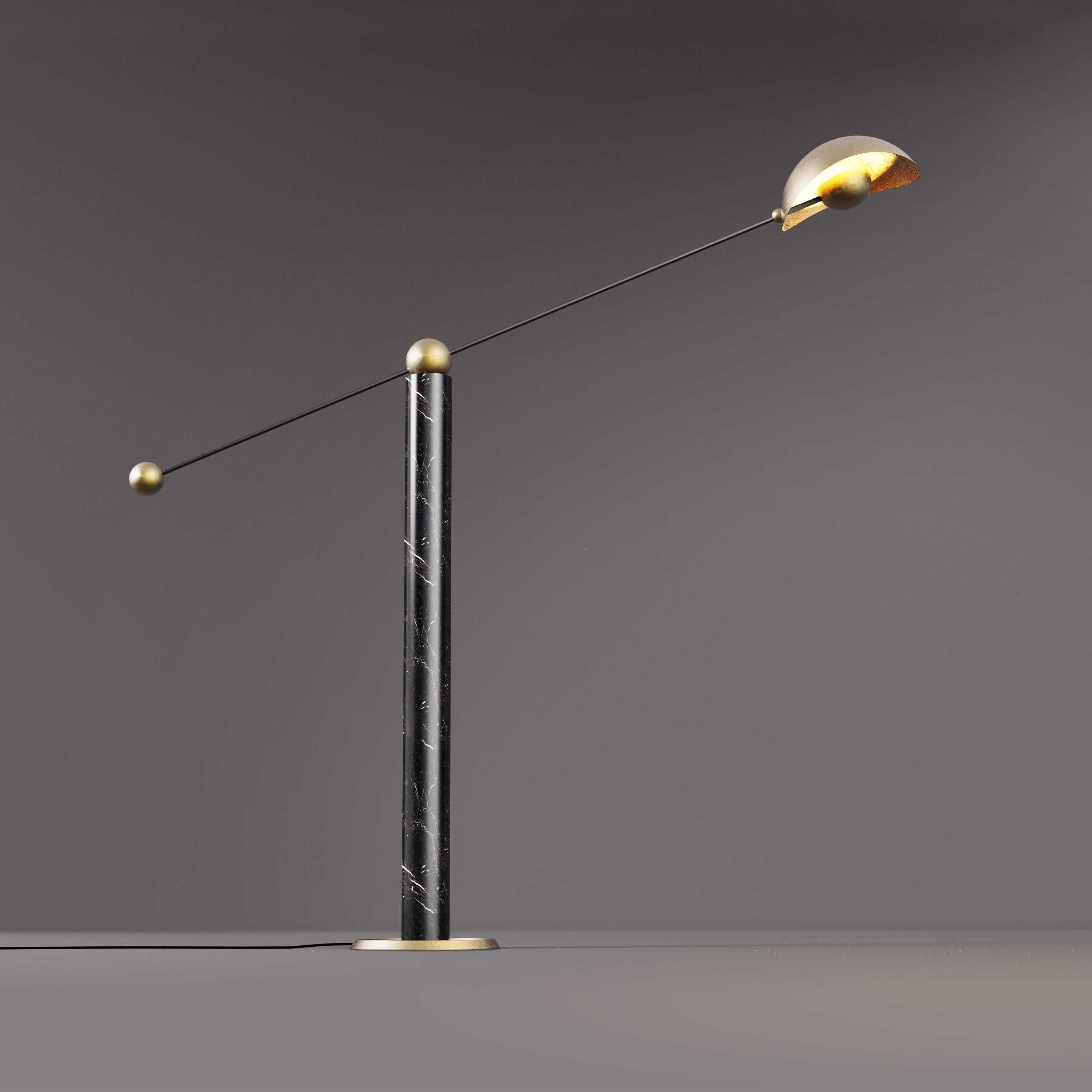 Pivoting floor lamp in black marble with blackened bronze and antique brass metalwork. 

Light Source: 1 x G9 lampholder 

Dimensions: 
Overall Width: 1322mm 
Overall Height: 1450mm 
Base Diameter: 248mm