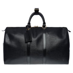 The very Chic Louis Vuitton Keepall 45 Travel bag in black épi leather