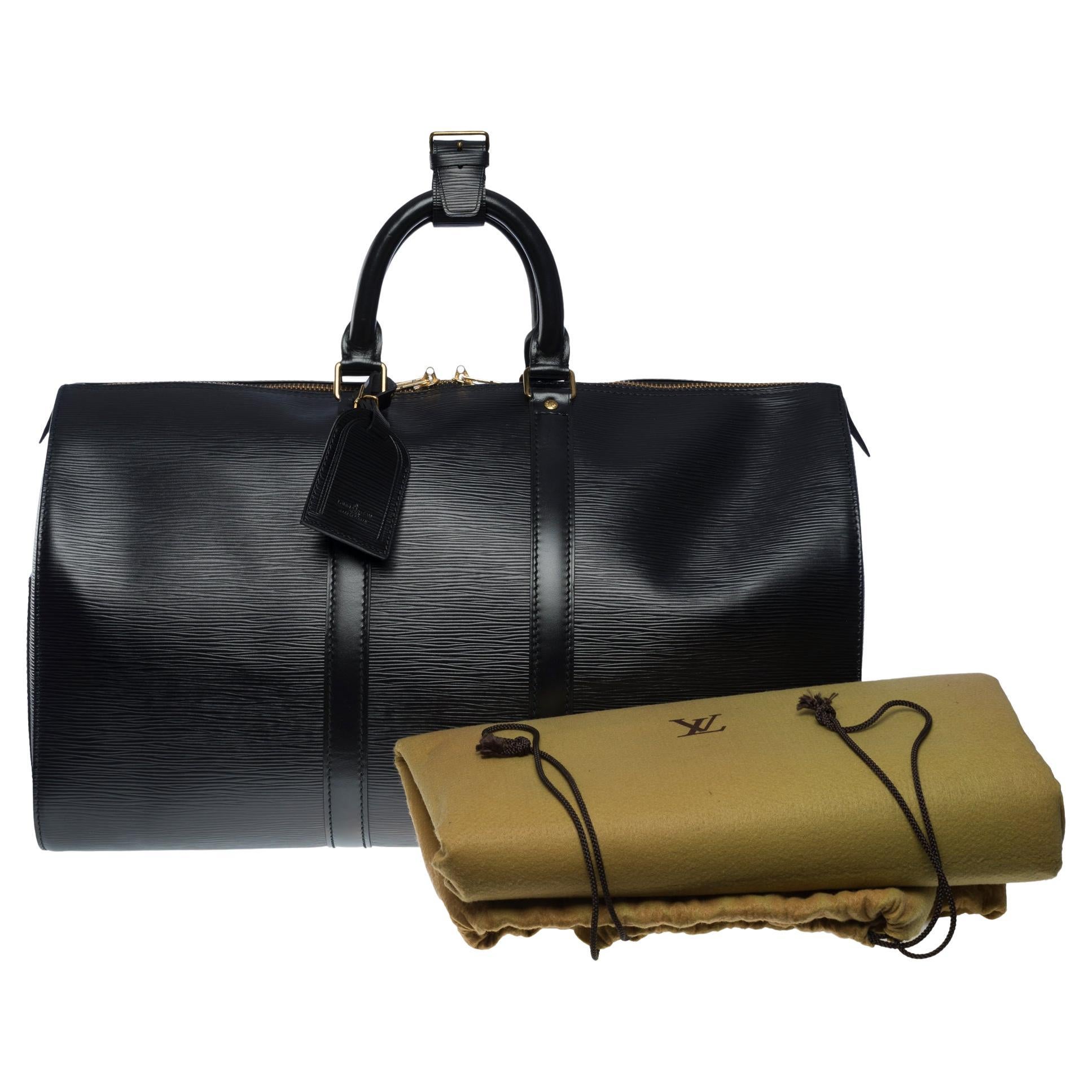 The very Chic Louis Vuitton Keepall 45 Travel bag in black epi