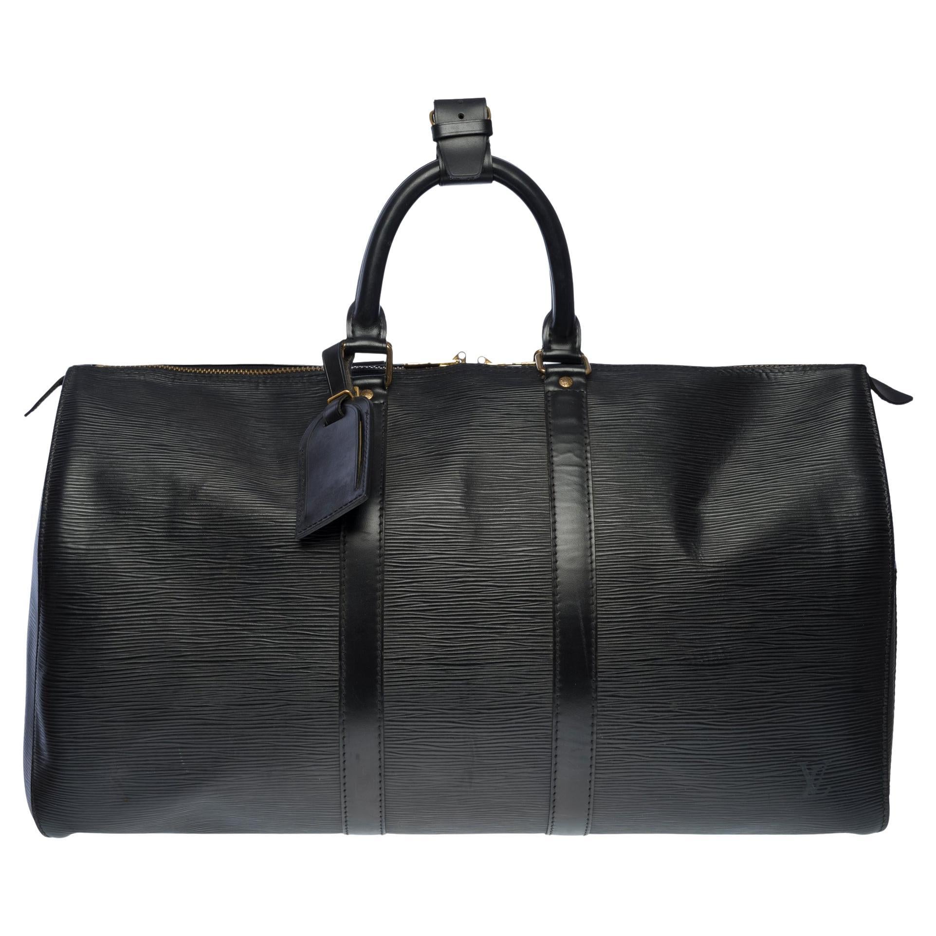 The very Chic Louis Vuitton Keepall 45 Travel bag in black epi leather, GHW