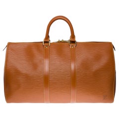 The very Chic Louis Vuitton Keepall 45 Travel bag in Cognac epi leather, GHW