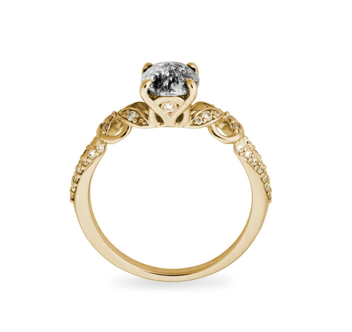 Named after Viviana Langhoff herself, and inspired by the metal work of the Belle Epoch, this intricately detailed ring features a gorgeous one-of-a-kind Salt + Pepper diamond center stone set in 14k yellow gold with sparkling diamond accents.