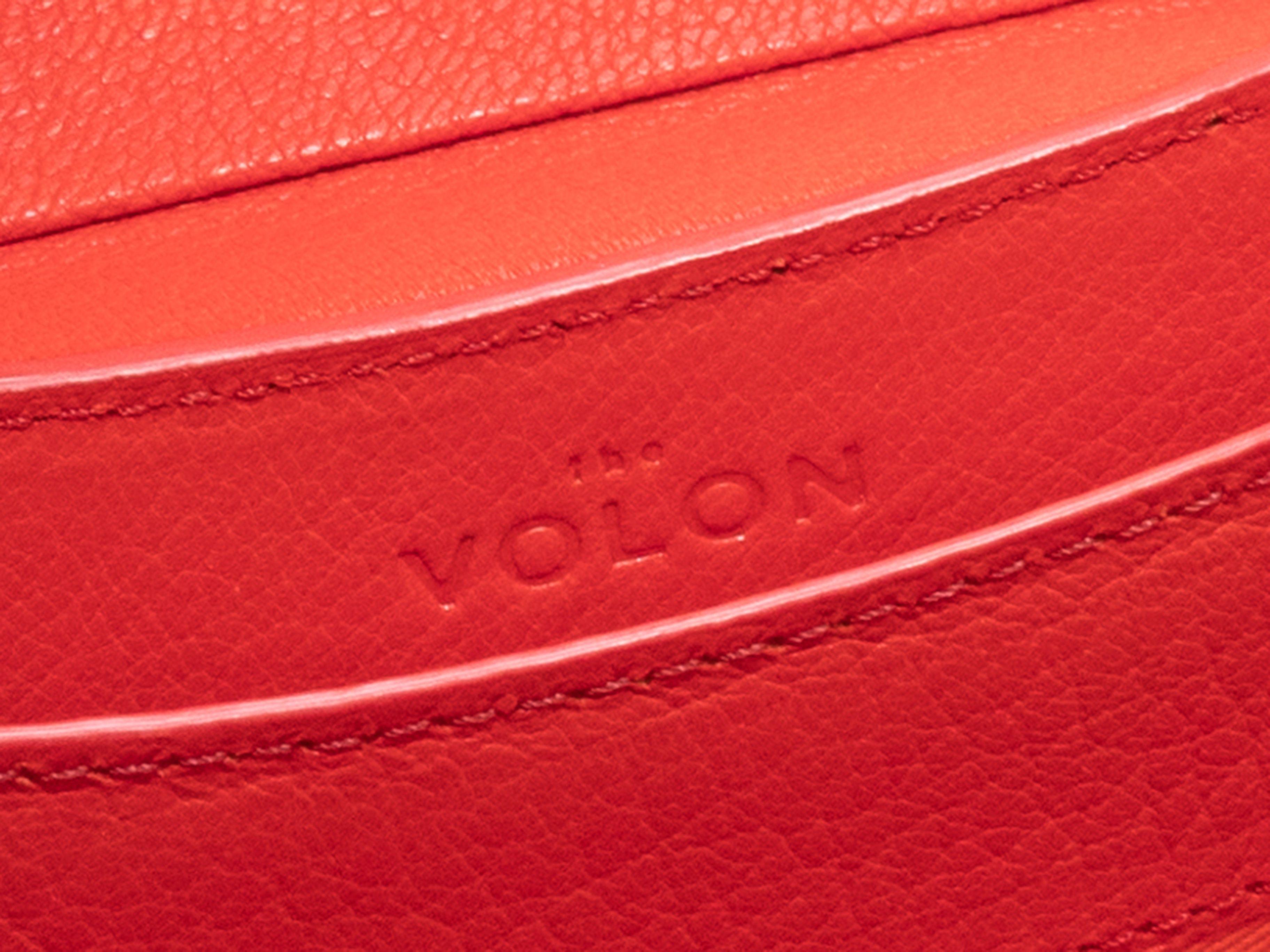 Produkt-Details: Schwarz & Multicolor The Volan Pailletten & Leder Handtasche. Diese Handtasche hat einen Körper aus Leder und Pailletten, goldfarbene Beschläge, einen einzelnen oberen Metallgriff und einen Verschluss an der Vorderseite. 7.5