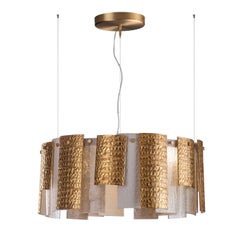 The Wall Lustre doré et transparent