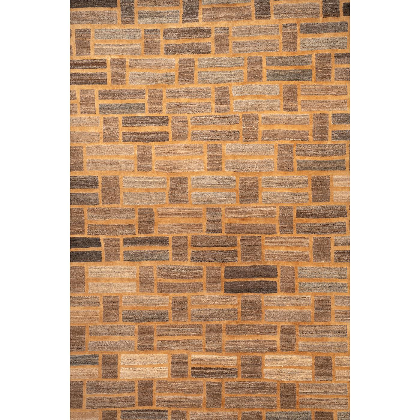 Named after the geometric pattern recalling a brick wall, this eye-catching rug is handwoven in Iran using a traditional Iranian knotting technique. Woven from the finest wool and hemp, the chromatic warmth and depth of the amber and chestnut tones