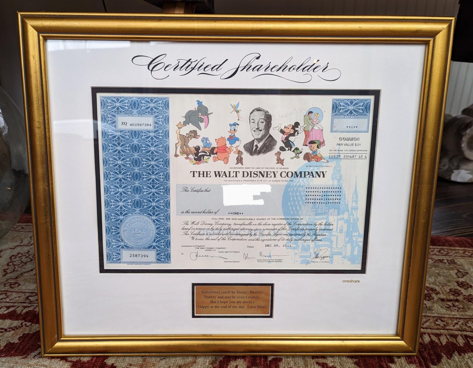 Collectible The Walt Disney Company Stock Certificate, dated 2011. One share of common stock, sold as a novelty stock certificate (address and name have been blocked out for online only). Professionally framed and matted, frame size is 17.5
