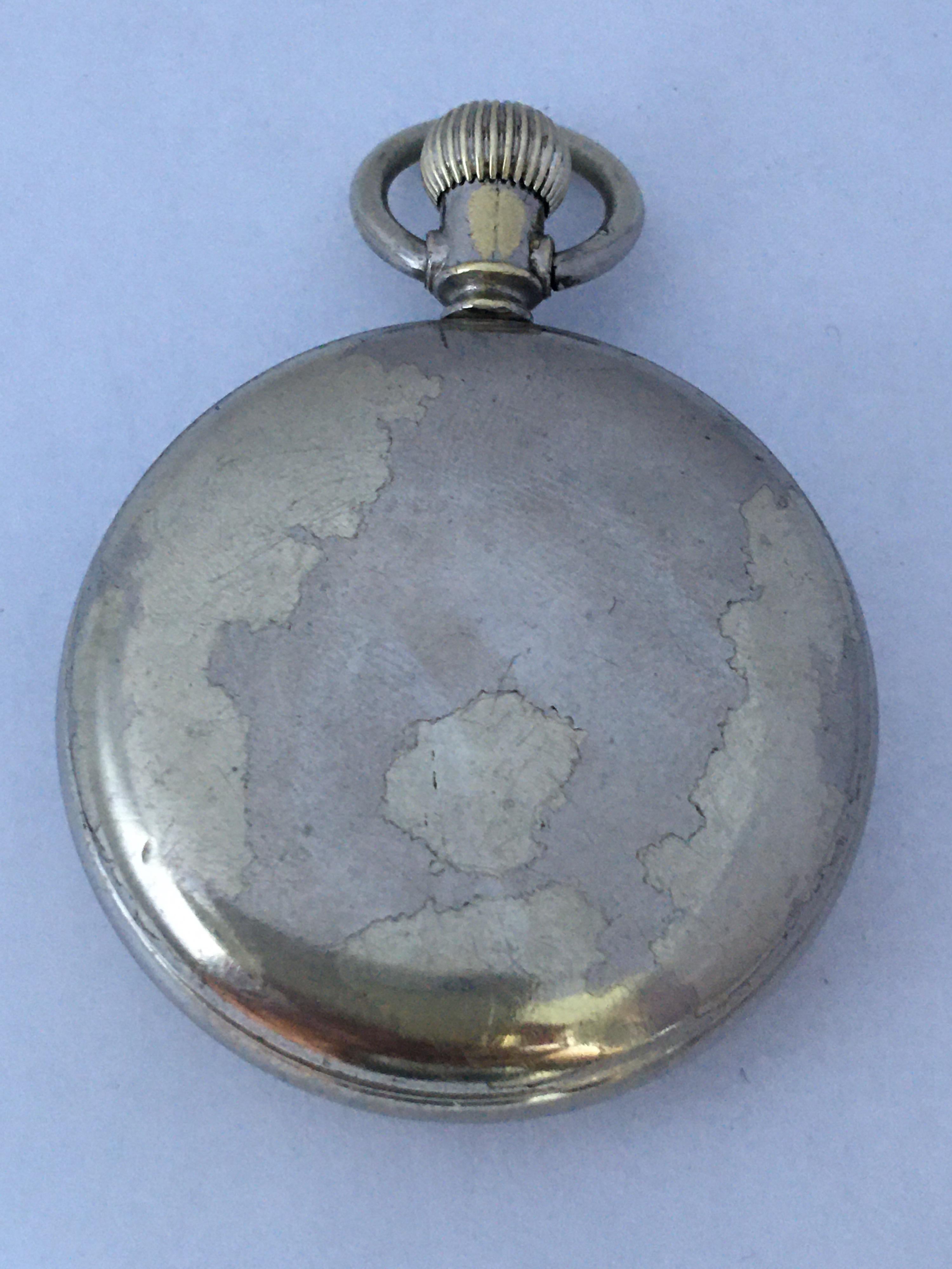 This beautiful 42mm diameter hand winding pocket watch is in good working condition and it is ticking nicely. It is recently been serviced.  Visible signs of ageing and wear with light marks on the glass surface and on the watch case as shown. The