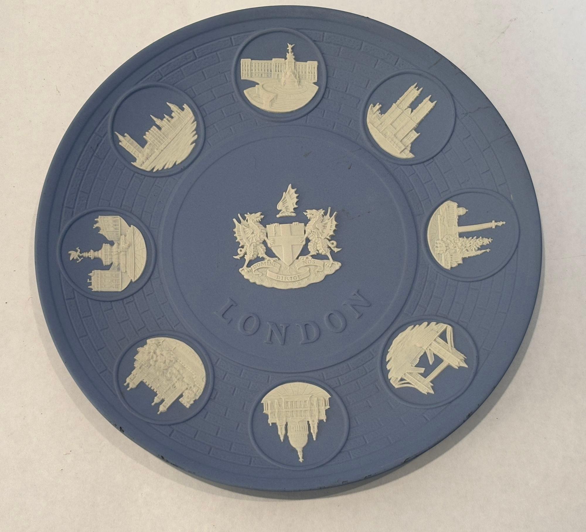 The Wedgwood Landmark Reliefs Plates, 1975 Pale Blue and White Jasper.
Wedgwood Jasperware collectors plate featuring eight London landmarks surrounding the city of London's coat of arms in the center and 