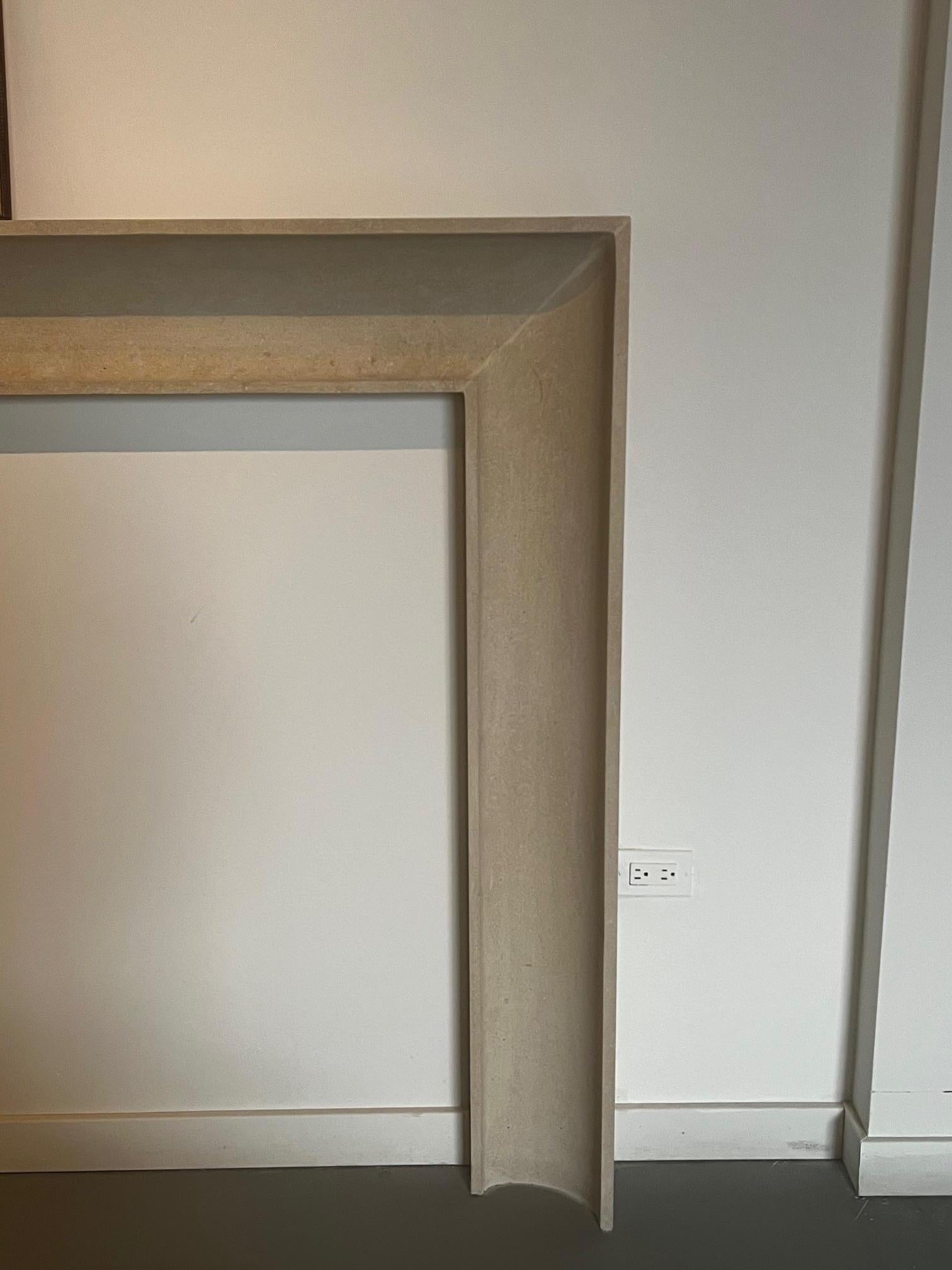 The Westchester: A Modern Carved Stone Fireplace with a Concave Profile In New Condition For Sale In Chicago, IL