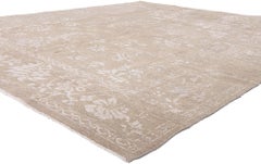 Nueva alfombra transicional de inspiración vintage con suaves tonos tierra