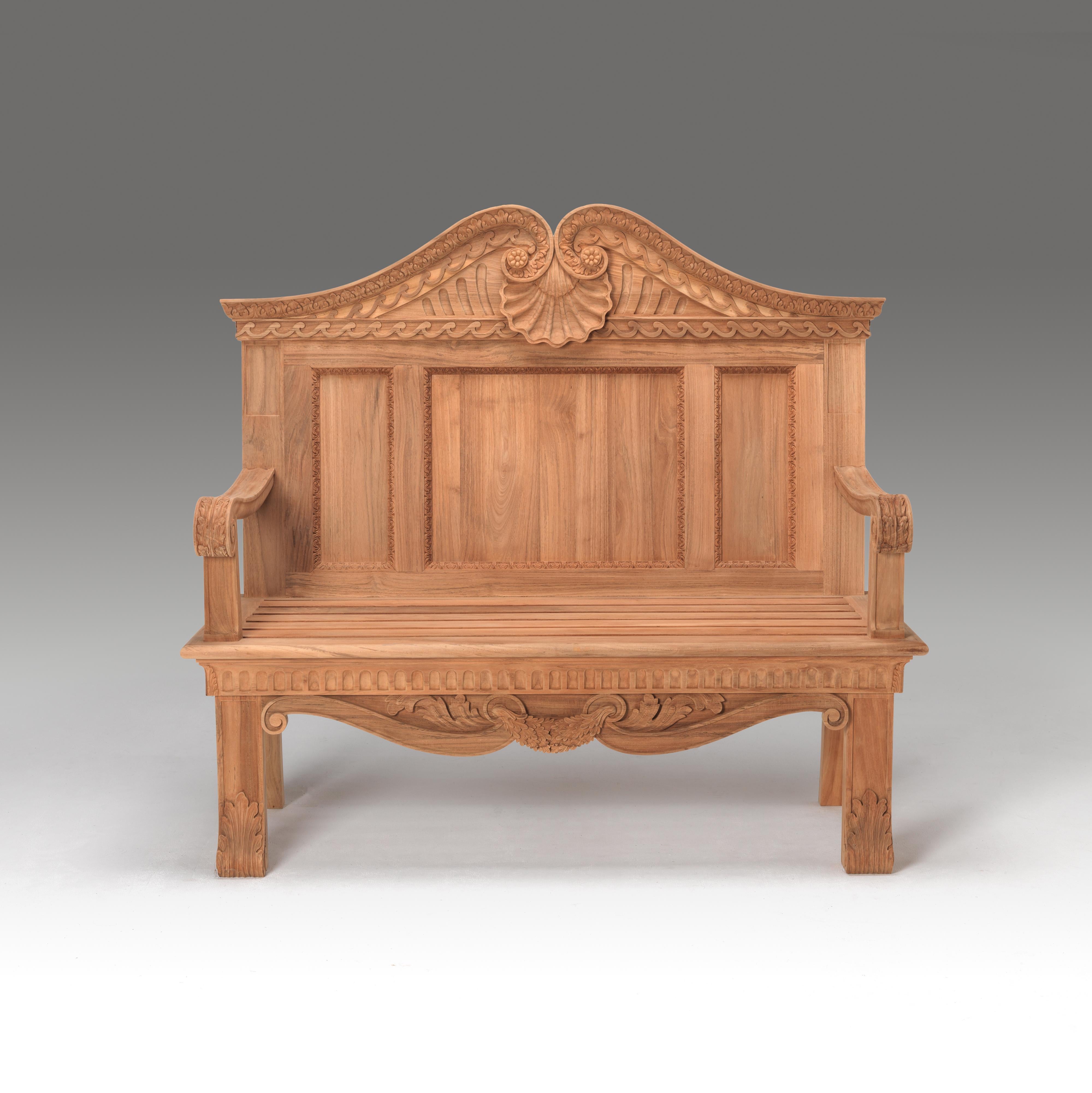 A fine William Kent carved teak garden or hall bench. The pedimented back with reverse carved shell below.
Please note we are we are currently working to a 30-36 week lead time. 