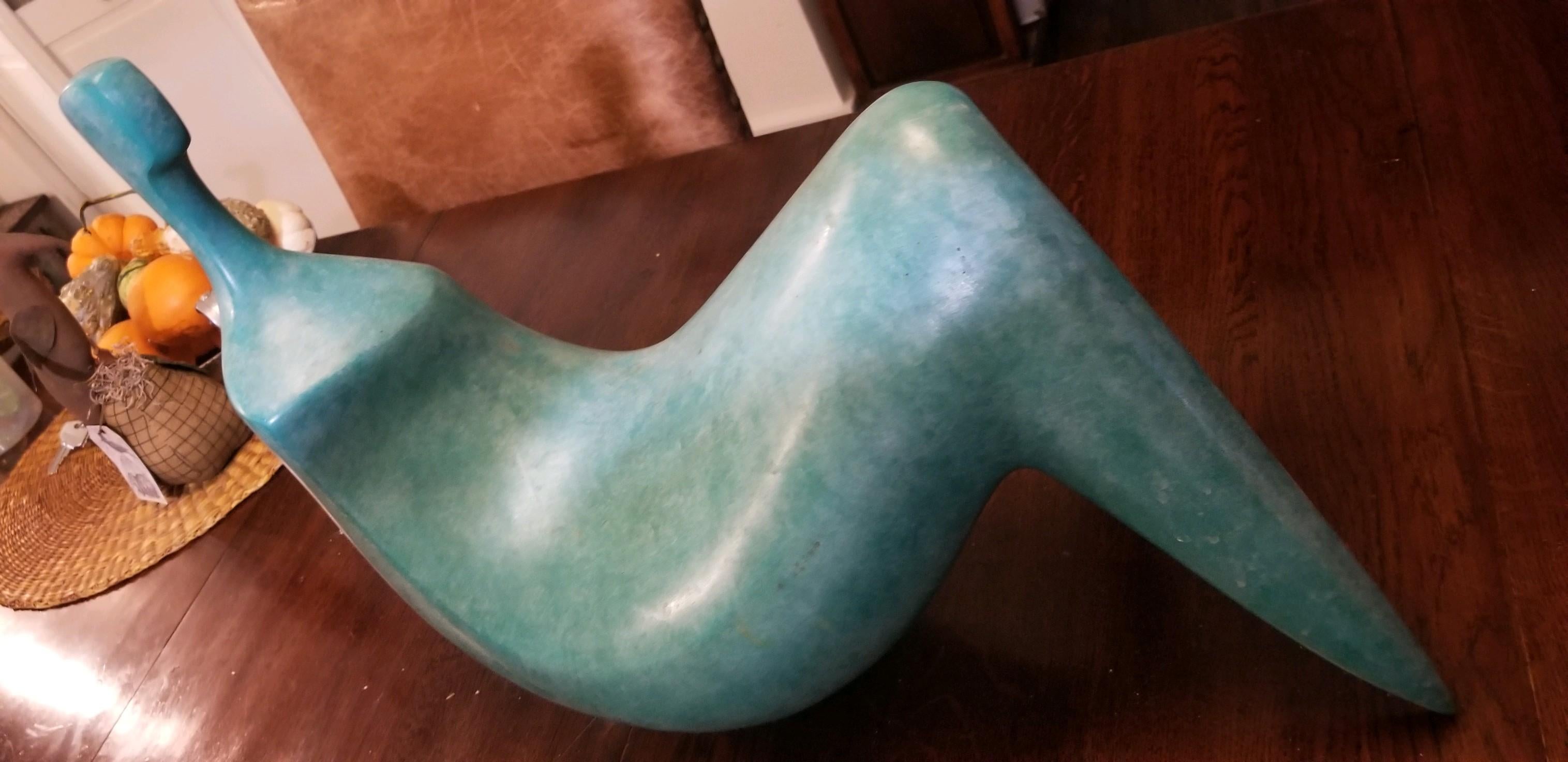 The Woman, by Itzik Ben Shalom, is his quintessential silhouette. Green patinated bronze, this shape has been achieved from Maquette through full size landscape. It is a midcentury inspired creation with the most beautiful finish of soft