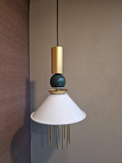 The Zephyr Pendant Light in Brushed Brass, Painted Steel with Matt Gold accents