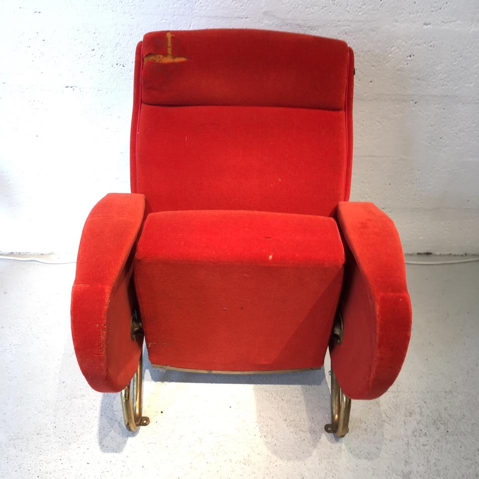 Rare armchair with original cover from the Rai Auditoriums in Turin - Design by Carlo Mollino, 1951. The armchair features the original velvet cover and brass base. Original conditions with tears on velvet.
Can be reupholstered on demand.
Original
