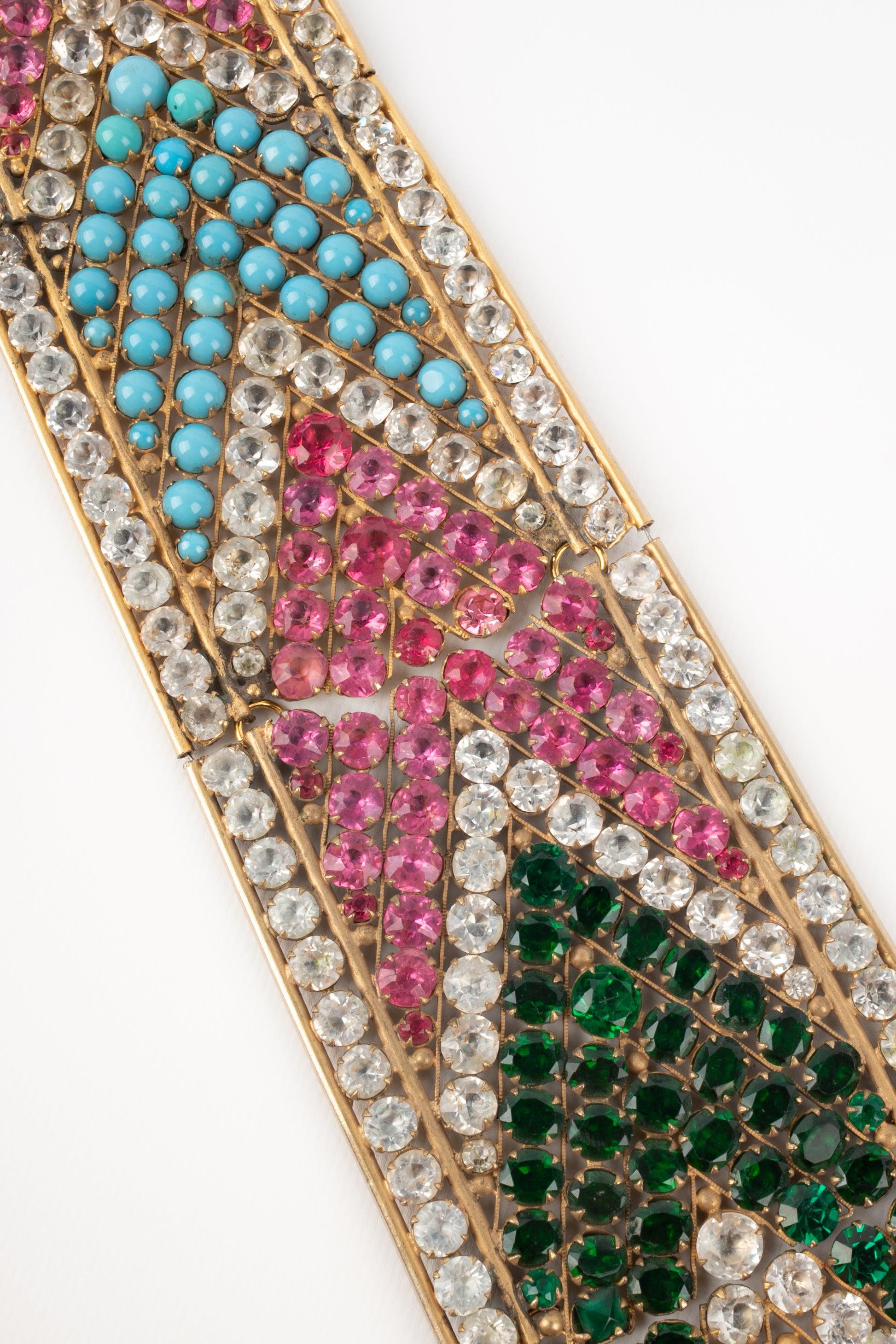 Theater - (Made in France) Impressive golden metal drama necklace with multicolored rhinestones.

Additional information:
Condition: Good condition
Dimensions: Neck circumference: from 41 cm to 44.5 cm - Length: 55 cm
Period: 20th Century

Seller