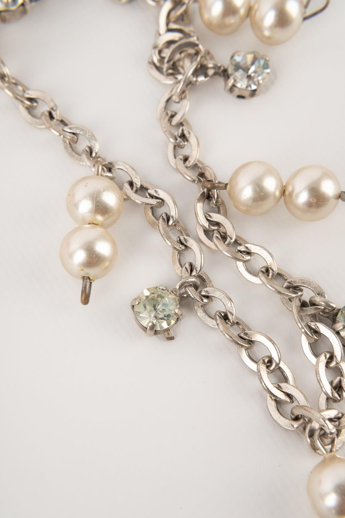 Women's Theater Silvery Metal Drama Arm Bracelet with Rhinestones and Pearls, 1920s For Sale
