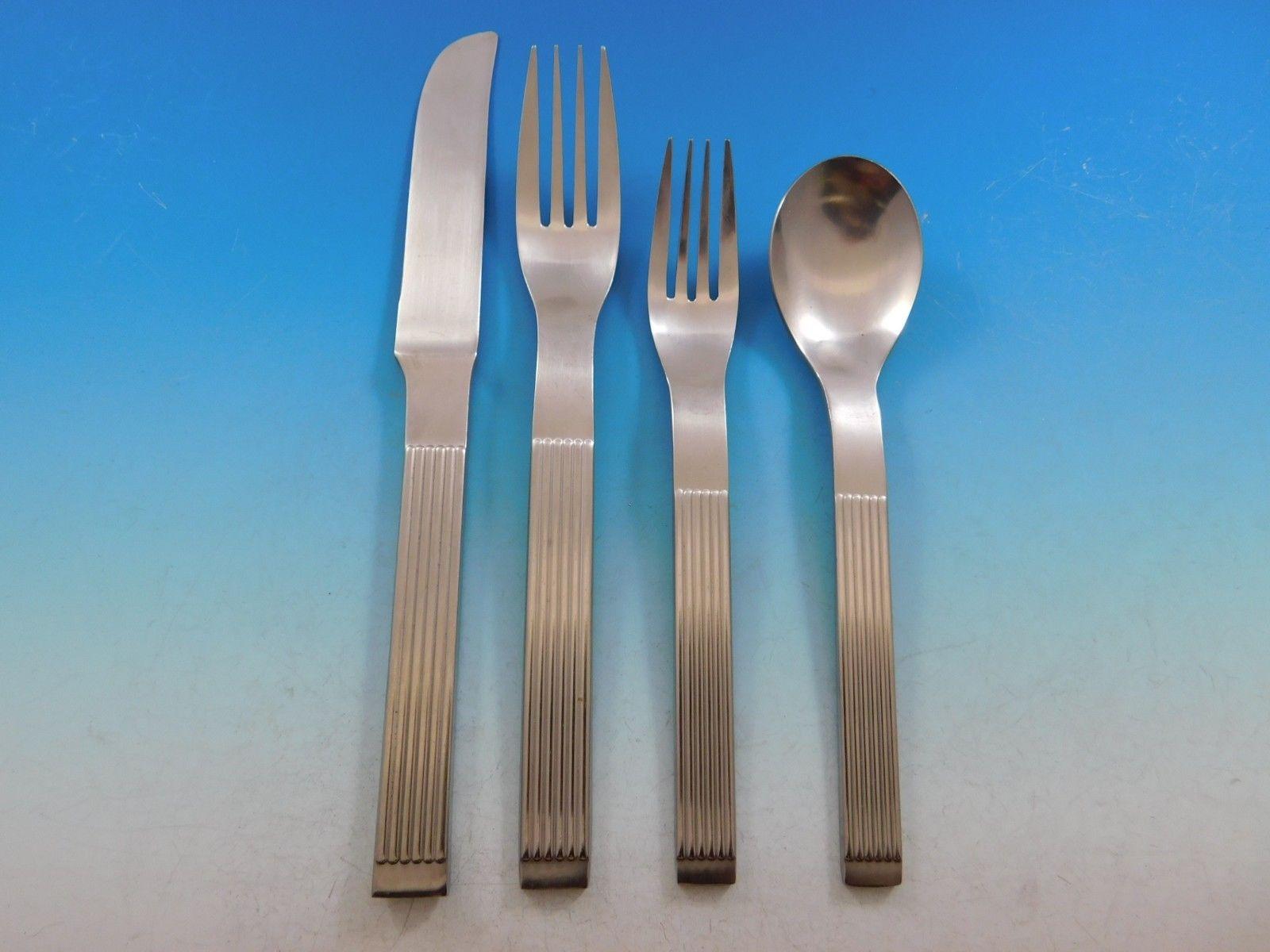 Thebe by Dansk Stainless flatware set - 20 pieces. This estate set includes:

4 dinner knives, 8 1/2