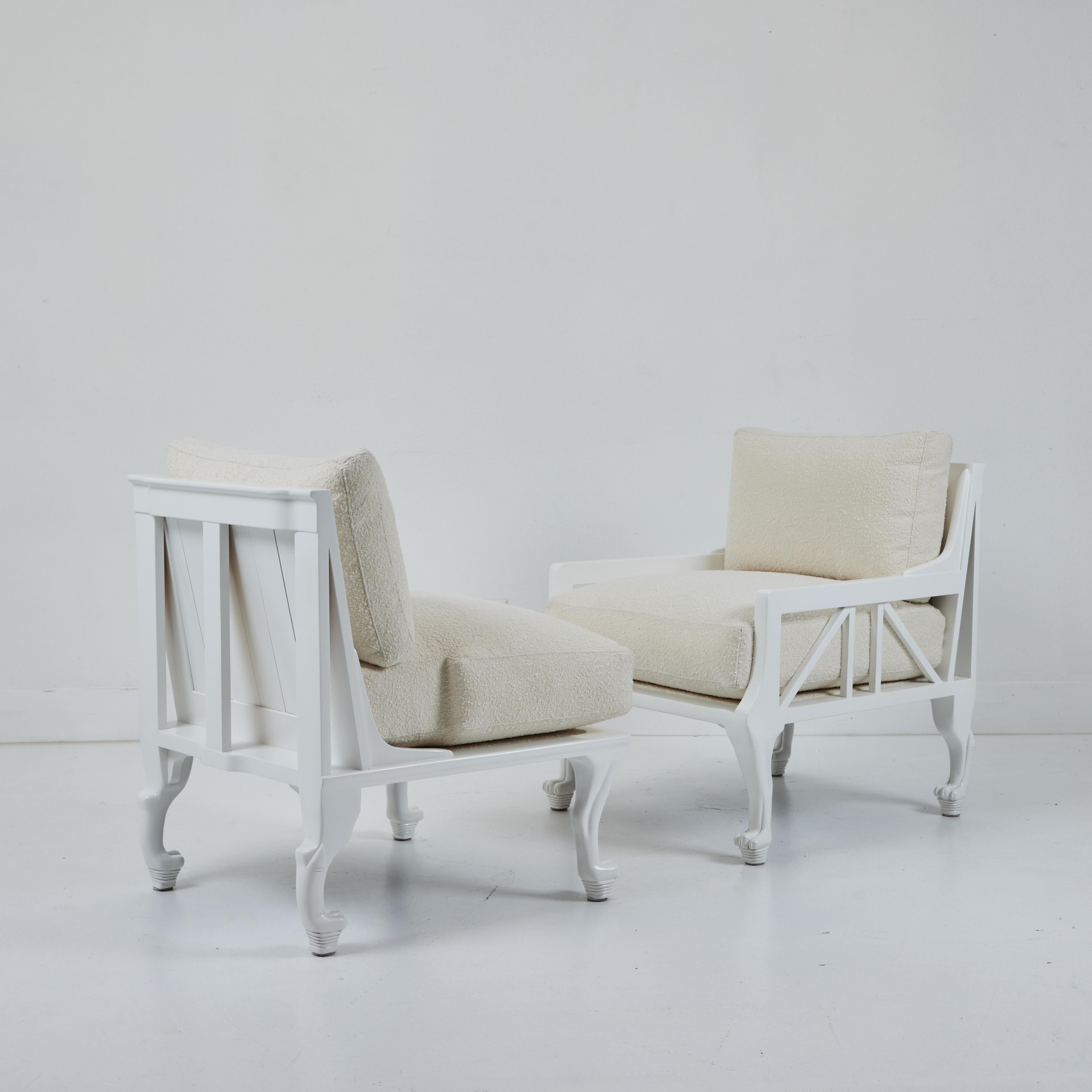 These are 2 wonderfully refinished and reupholstered Thebes chairs by John Hutton for Randolf and Hein. They are not a pair; one is an arm chair while the other is a slipper chair with no arms. They have been reupholstered in a soft cream boucle.