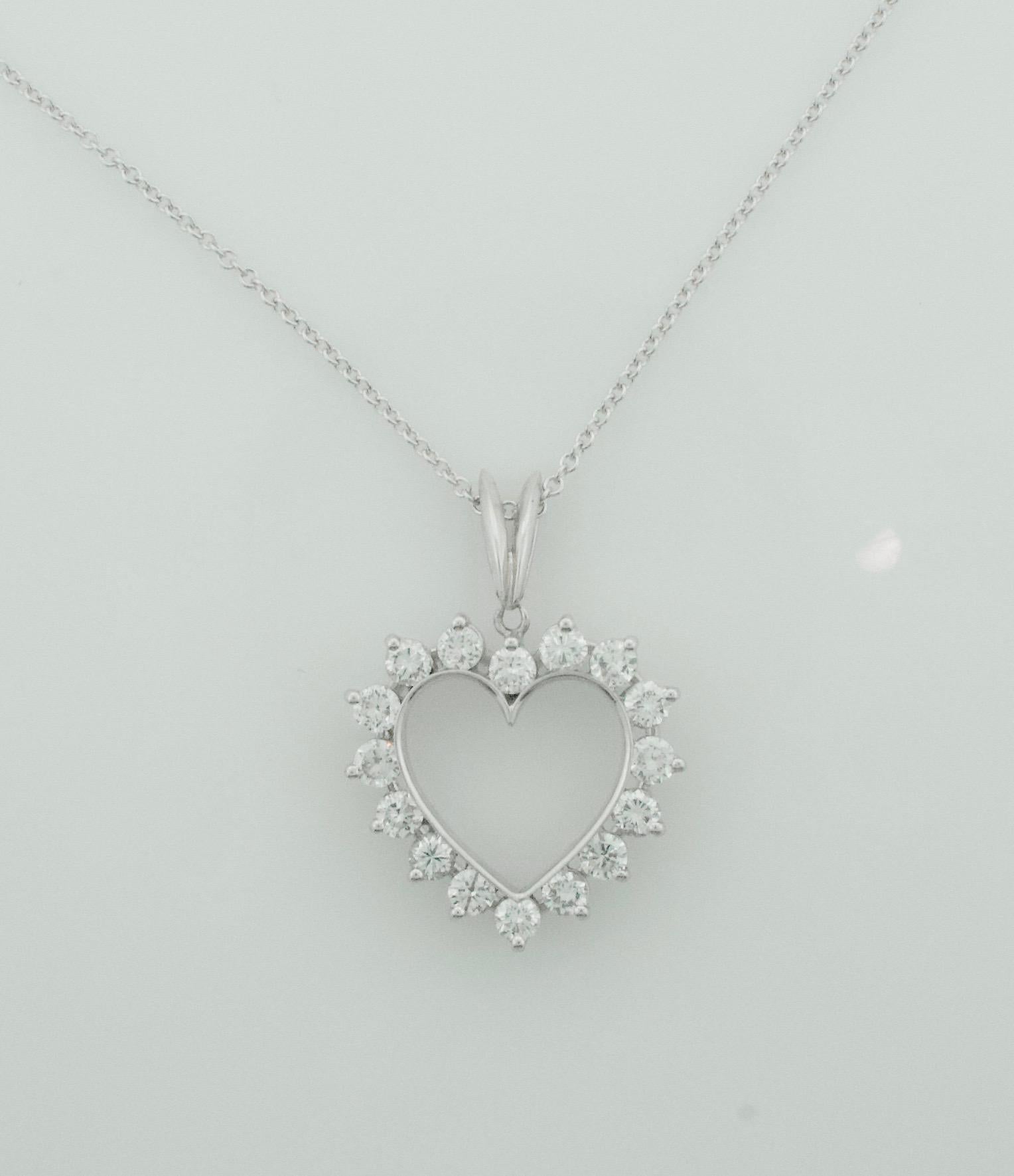 Thee Classic Diamond Heart Pendant on Chain 1.75 Carats Circa 1960's
16 Round Brilliant Cut Diamonds Weighing 1.75 Carats Approximately [GH VVS-VS1]
Very Finely Made 
On a 18k 16 inch Fine Chain