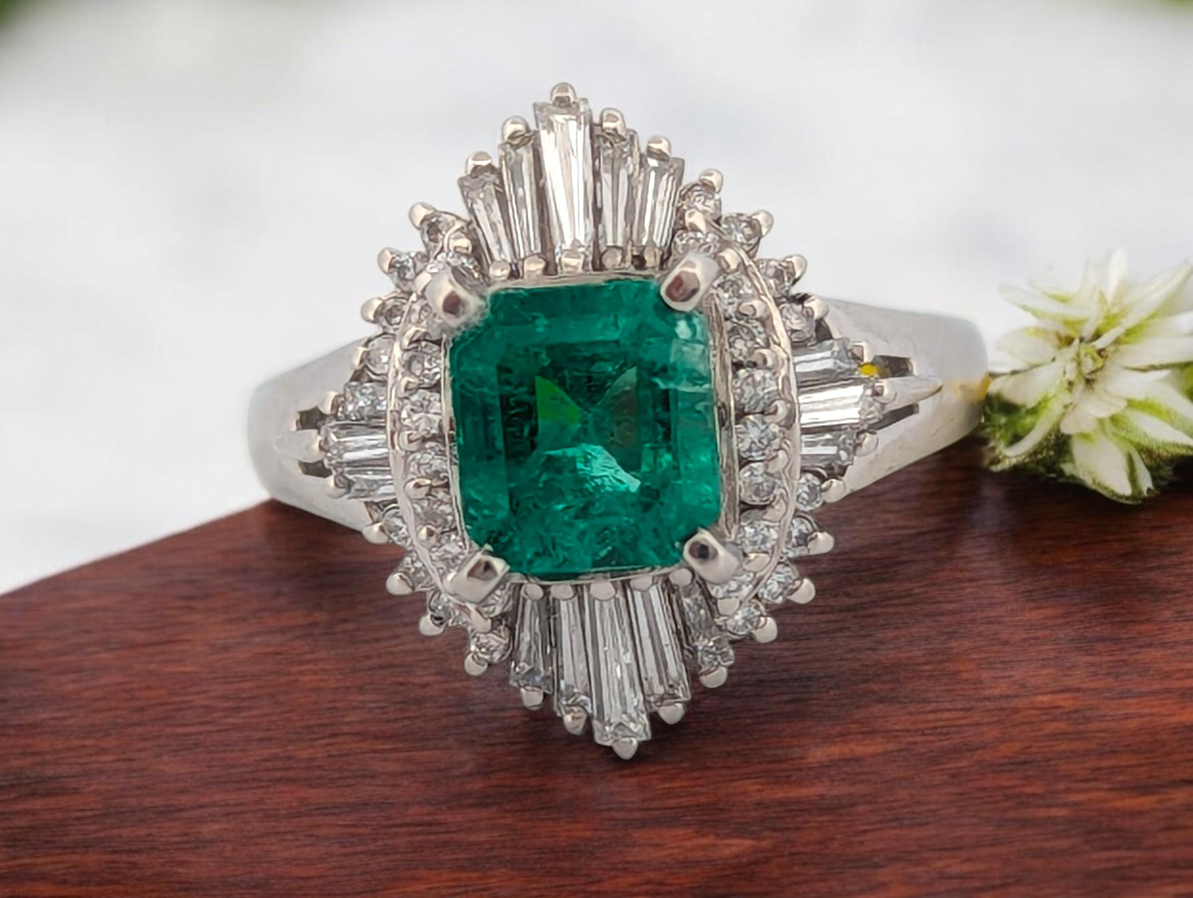 Thekla is a showstopping platinum ring featuring a rare and captivating 2.52 CT GIA certified natural Colombian Emerald in an elegant octagonal step cut (F2 clarity). Framed with 1.11 CTW natural diamonds, this piece radiates refined brilliance and