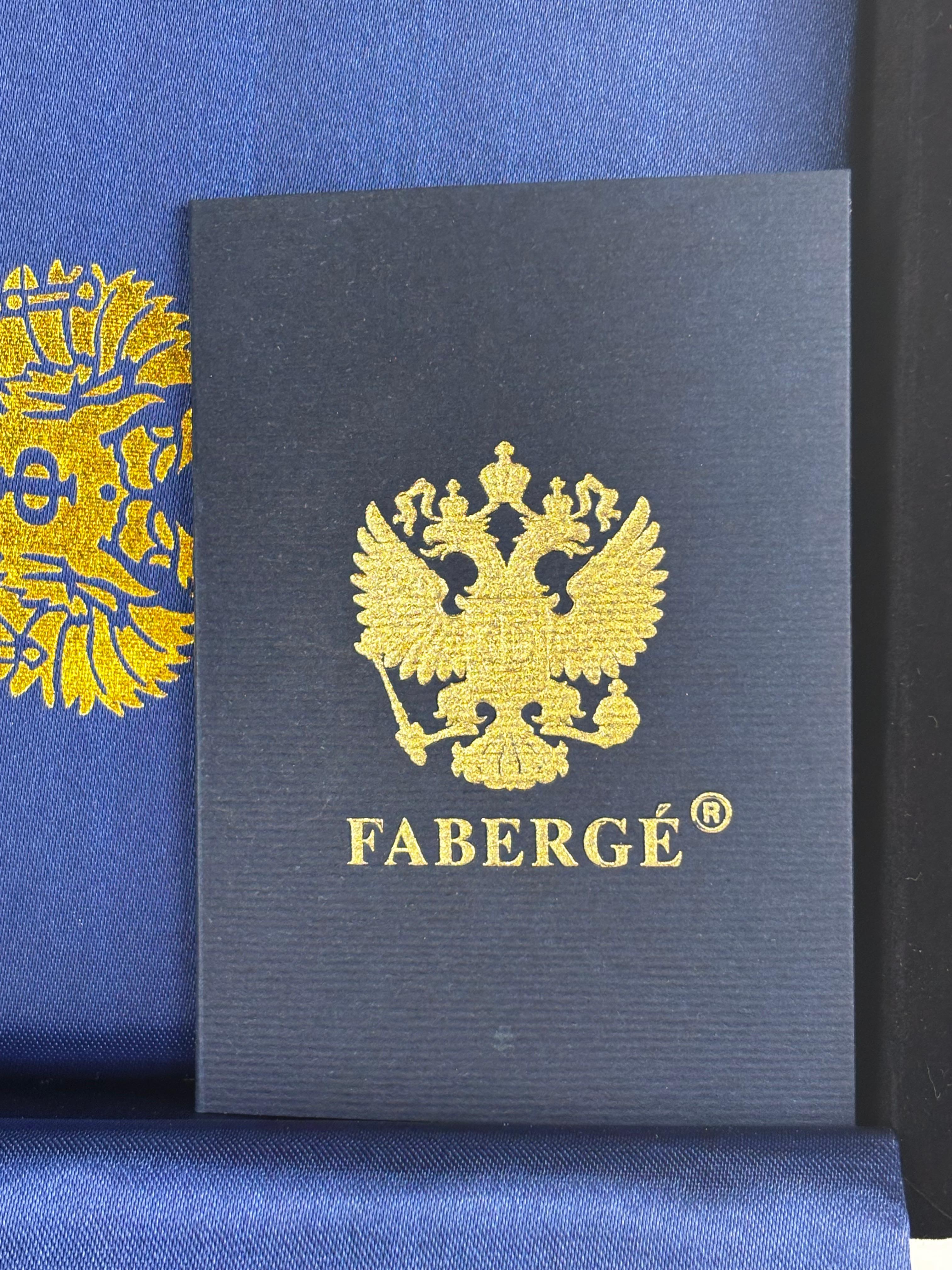 Fabergé - Huevo de cristal de roca y bronce -  Con certificado y caja original For Sale 9