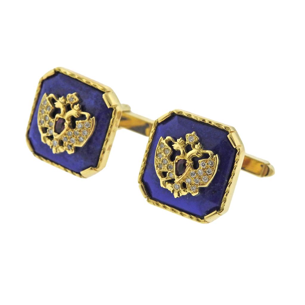 Pair of 18k yellow gold cufflinks, crafted by grandson of Carl Faberge - Theo Faberge, set with lapis, diamonds and rubies, featuring double headed eagles from Romanov collection. Come with original box. Cufflinks are 17.5mm x 17.5mm and weigh 15.9