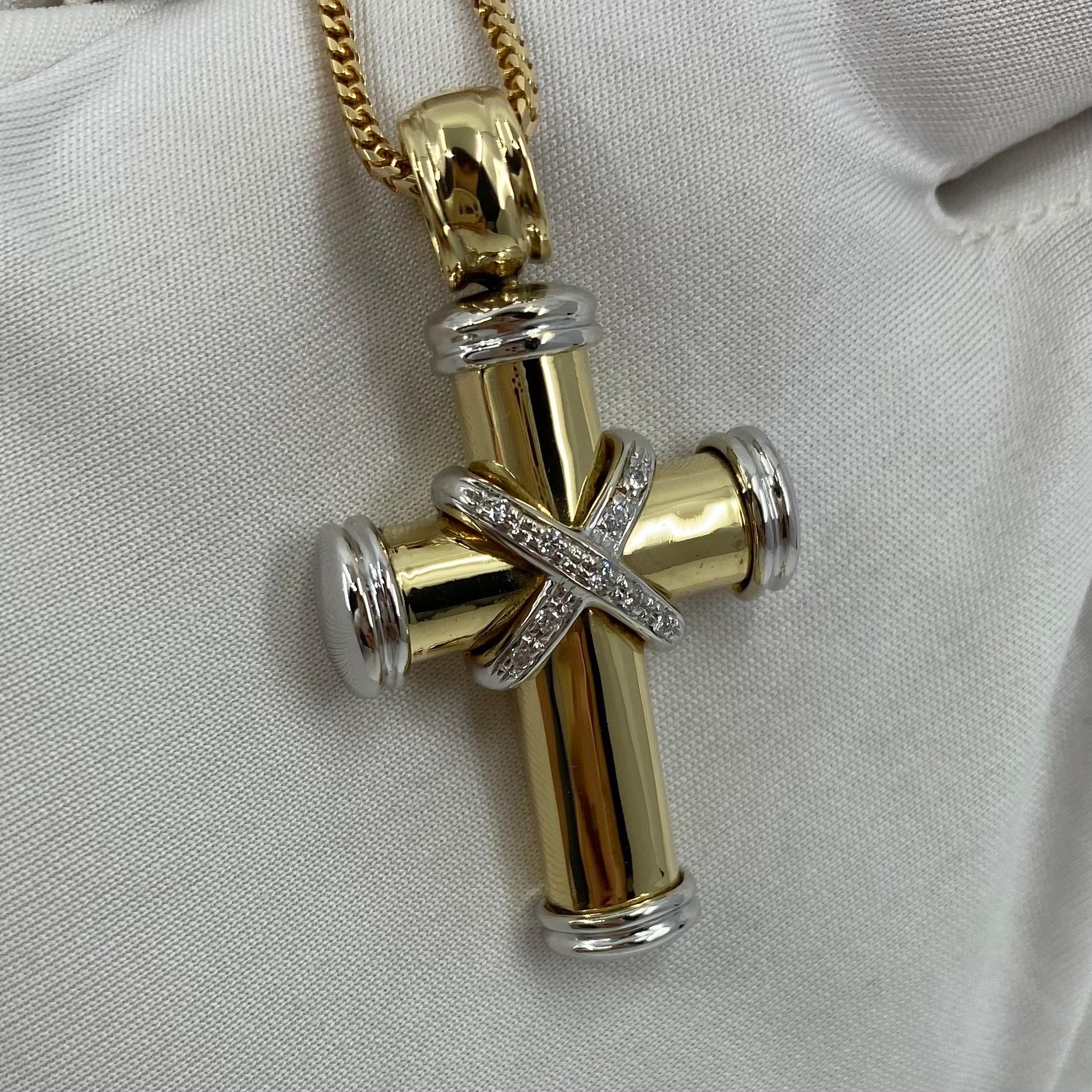 Theo Fennel 18 Karat Yellow & White Gold Diamond Cross Pendant Necklace.

Theo Fennel is a prominent and talented British designer, famed for collections such as his 'cross' designs.
This is a stunning yellow & white gold cross set with diamonds.