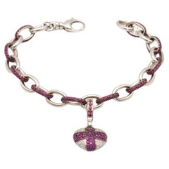Theo Fennell Pulsera de oro blanco de 18 quilates con colgante de corazón de rubí y diamantes